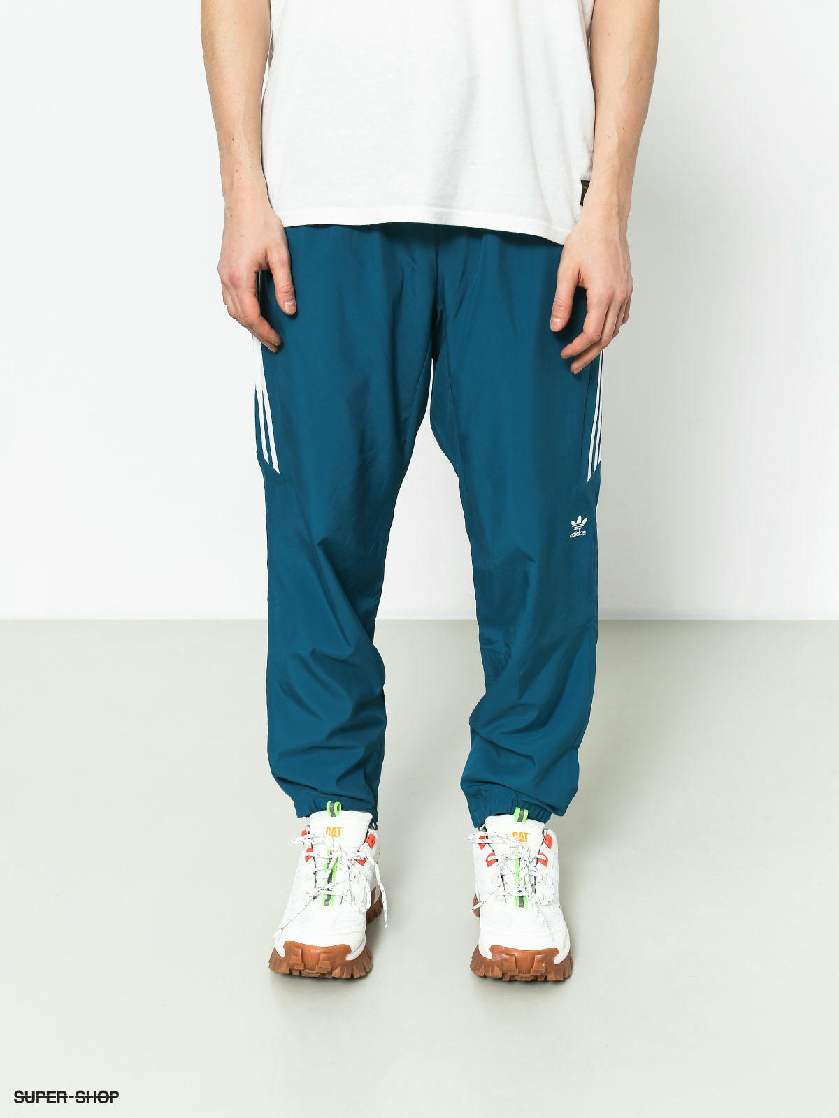 teal adidas track pants