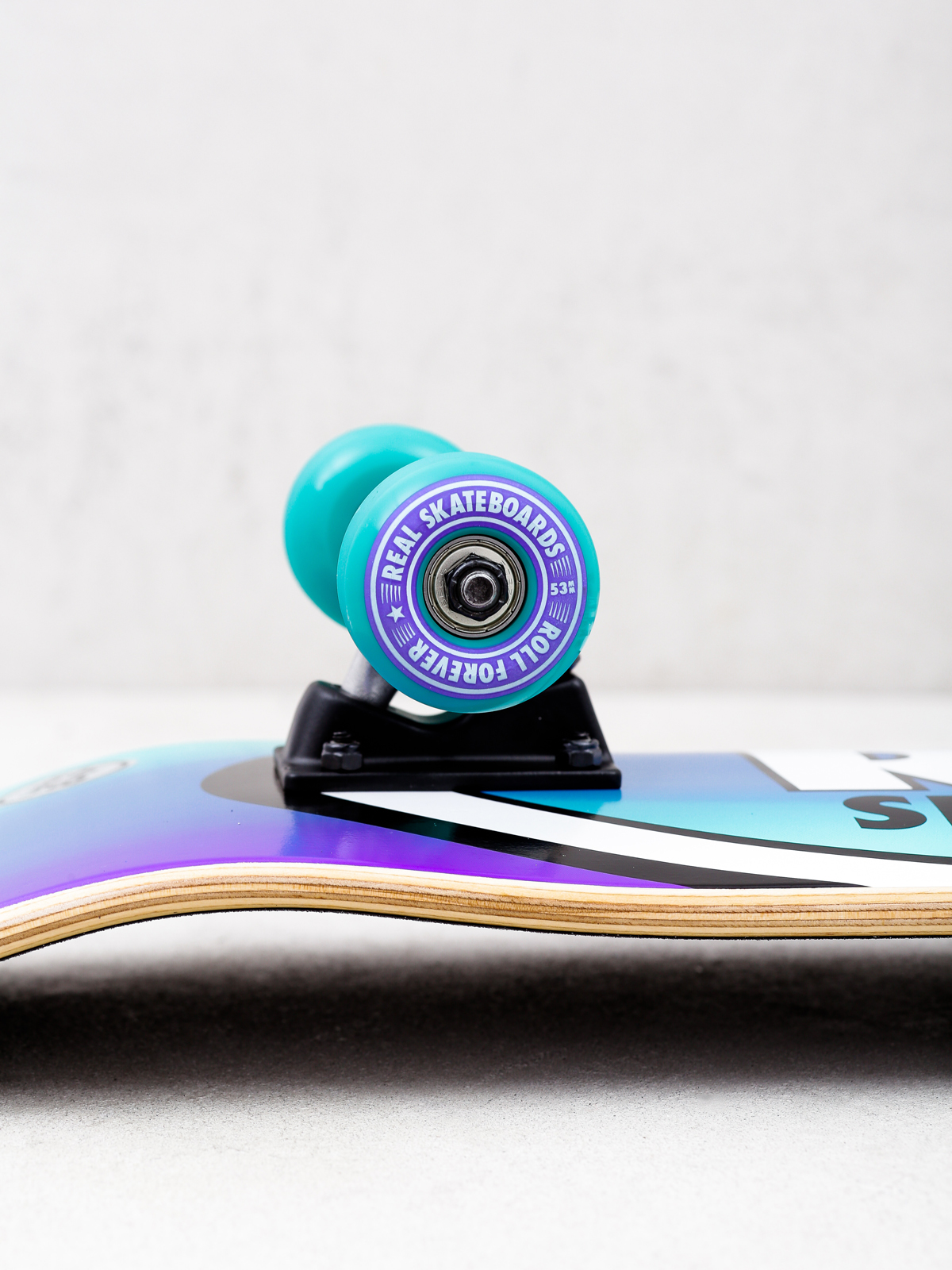 Real Fades Skateboard (purple/teal)