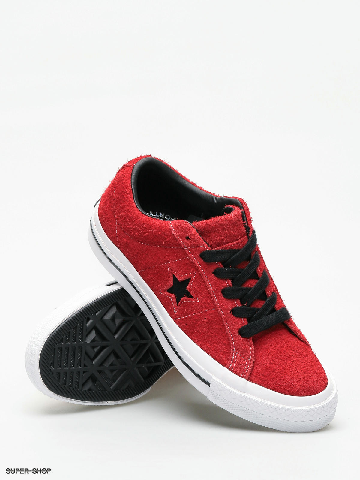 red and black high top converse
