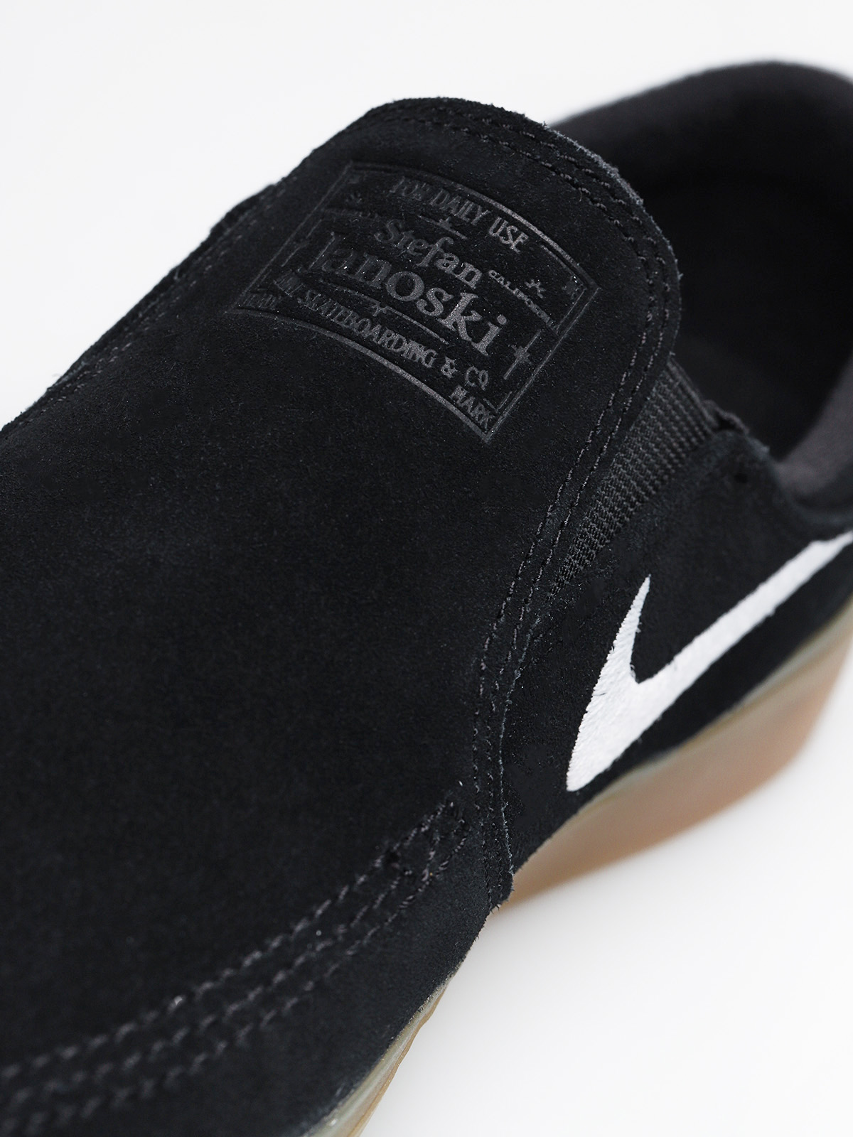 Nike janoski slip on black gum deals