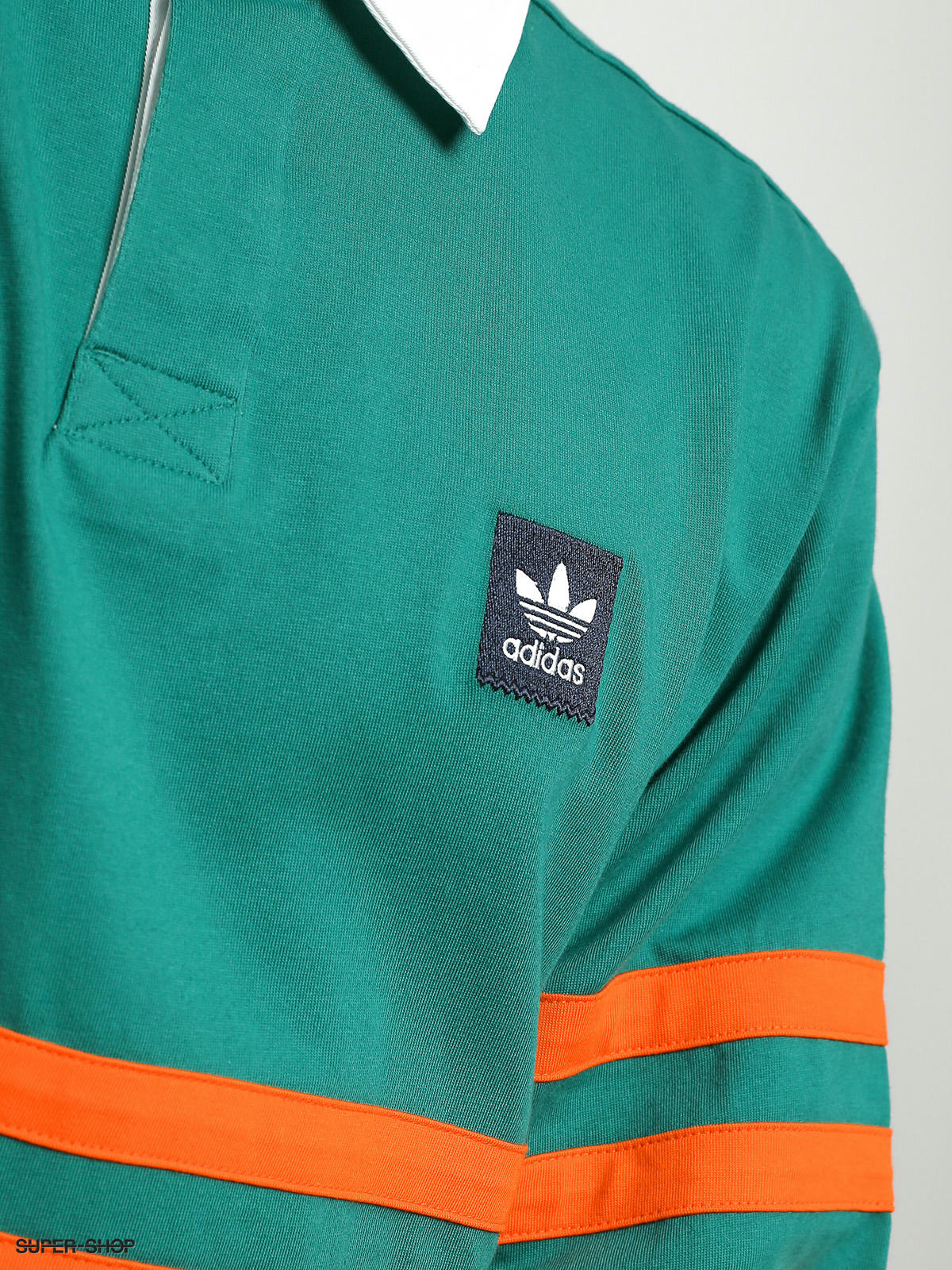 green and orange adidas shirt