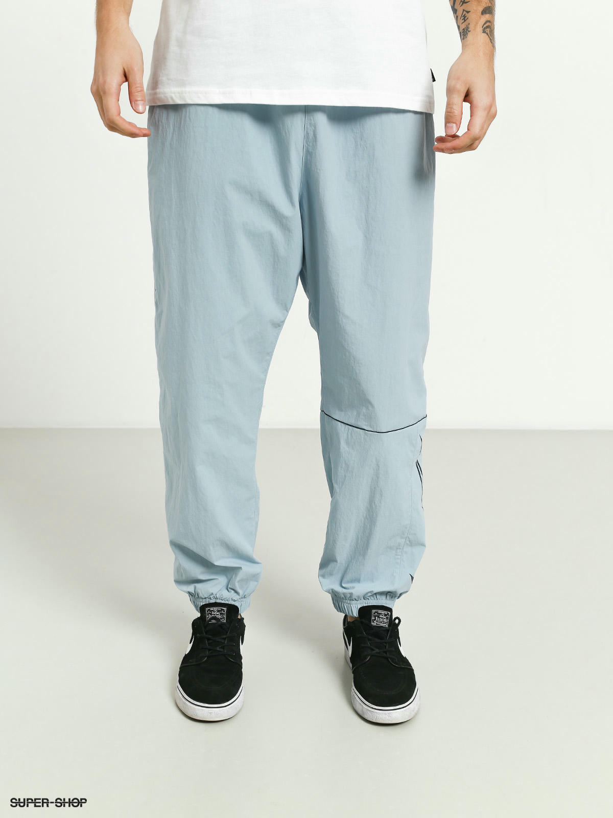 nike sb swoosh track pants blue