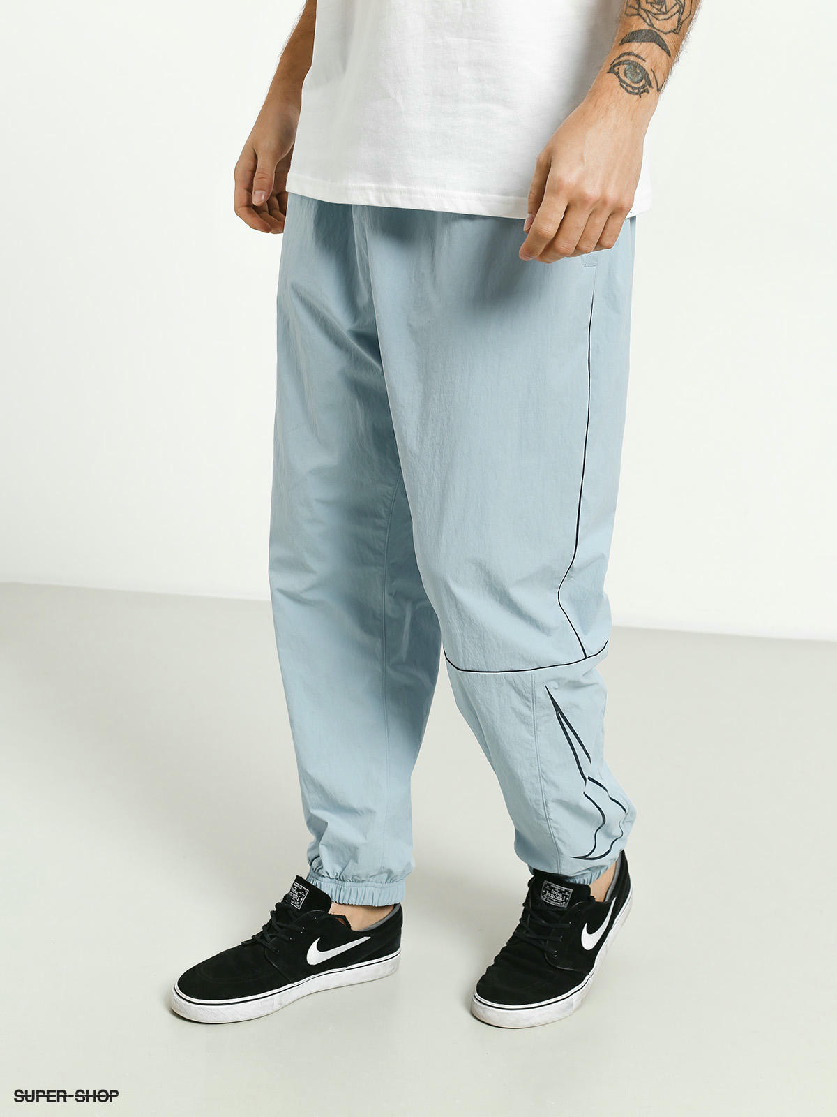 nike sb track pants blue