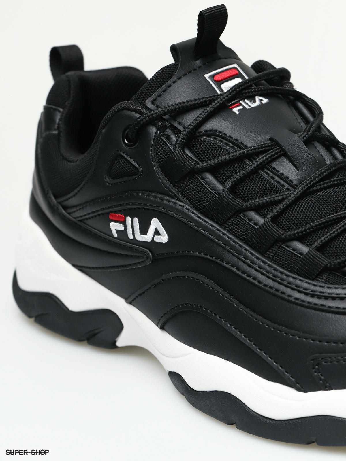 fila plain black shoes