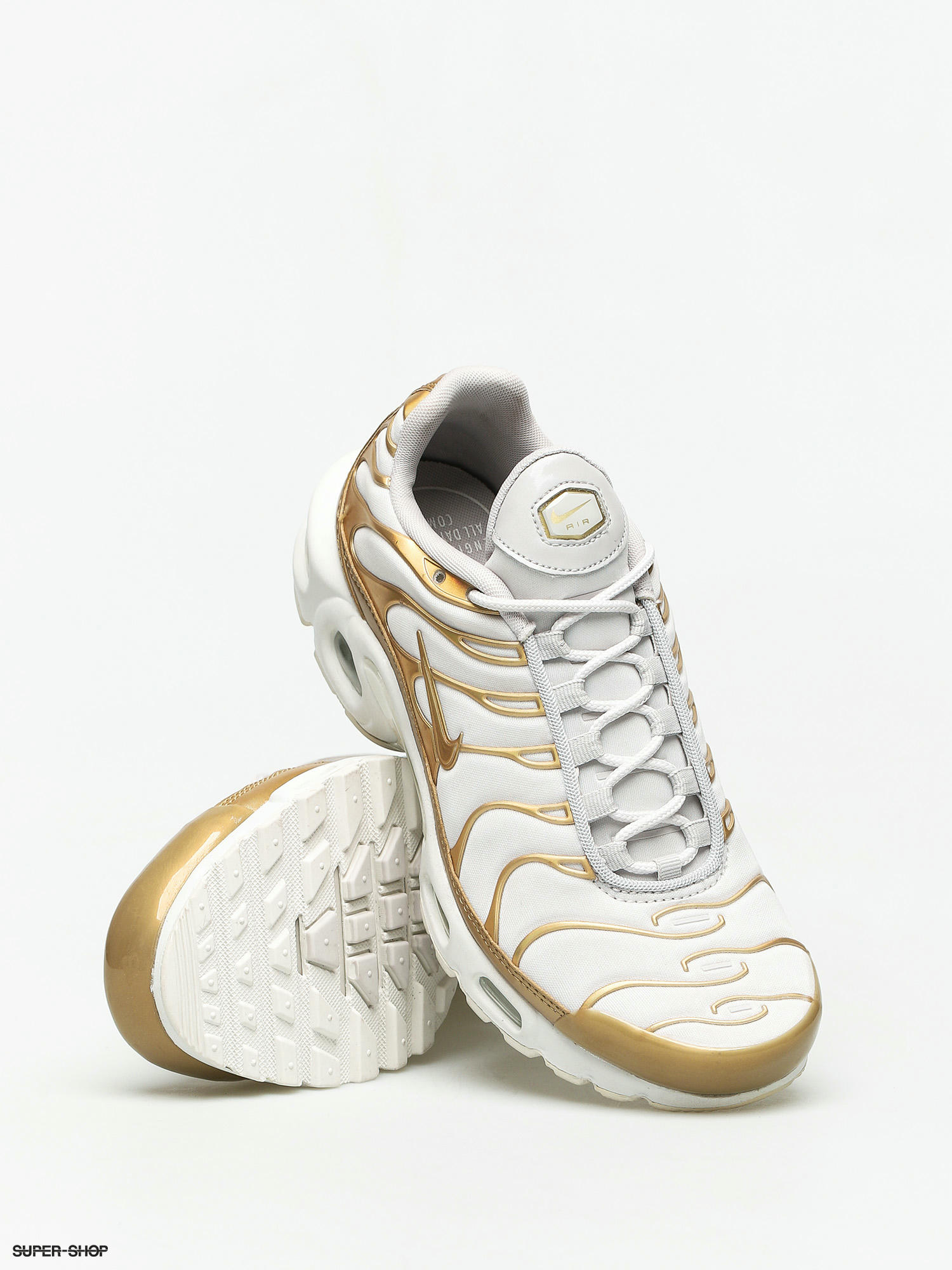 white and gold air max plus