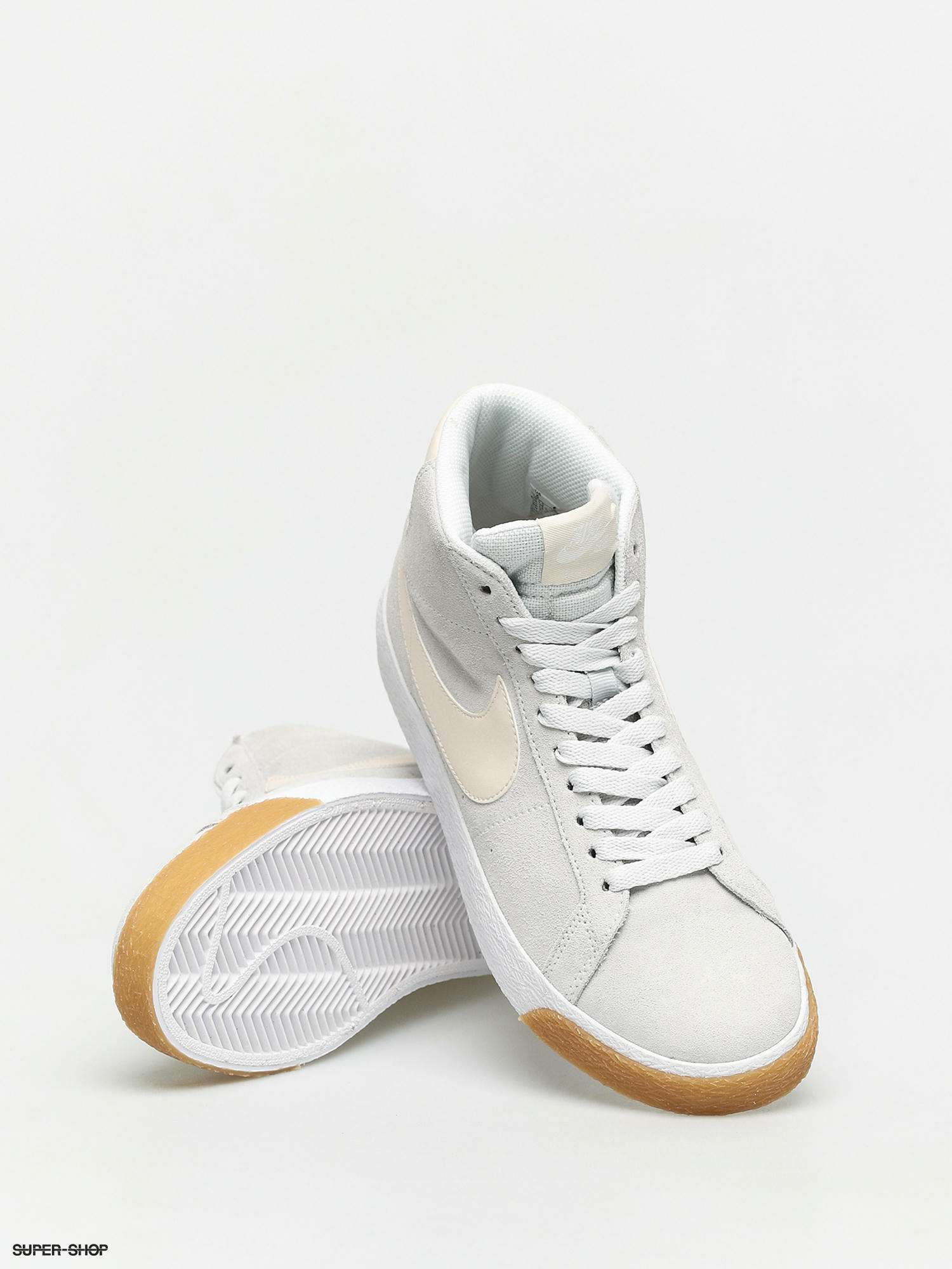 cream white nike shoes