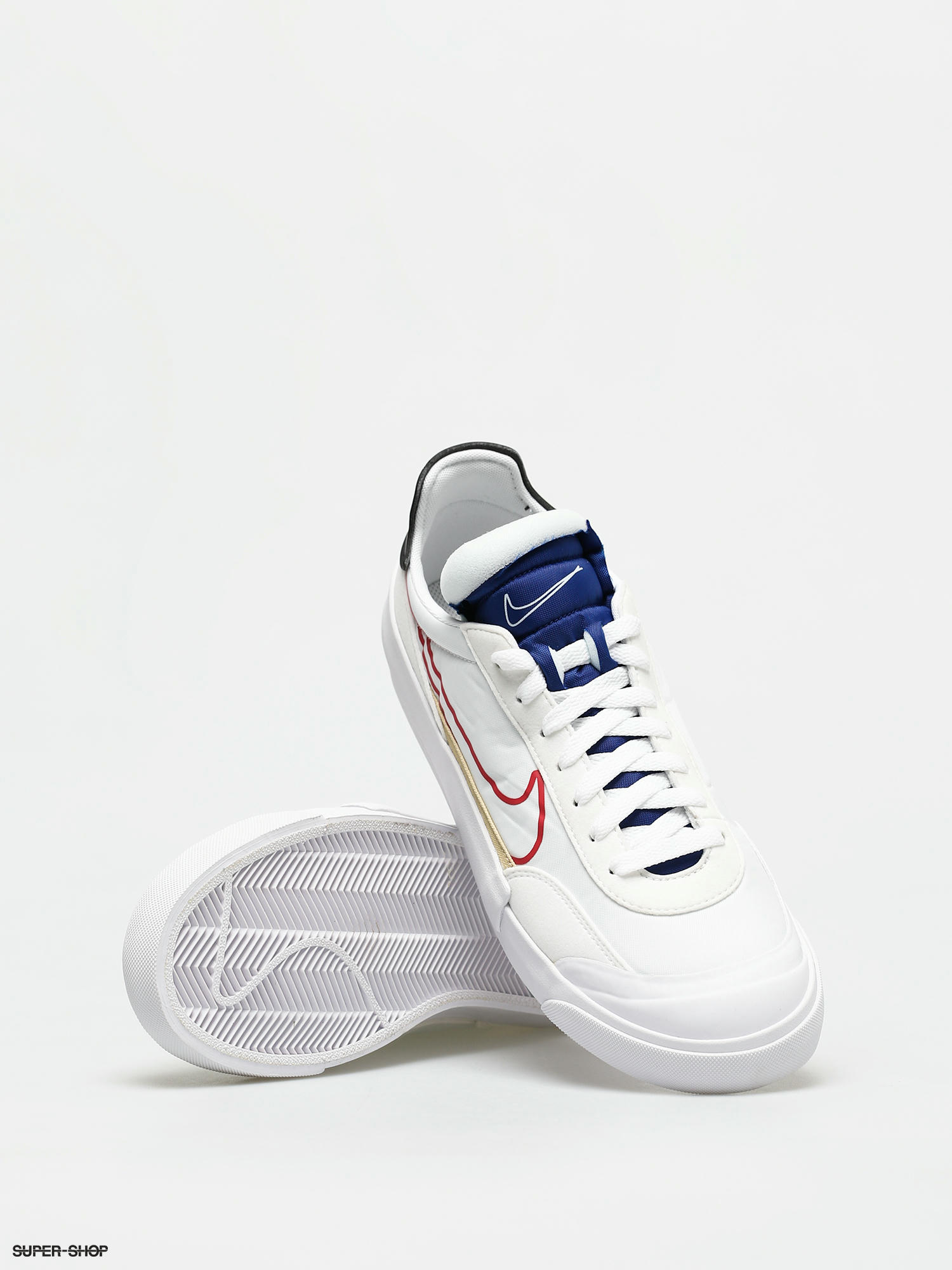 white and royal blue nike shoes