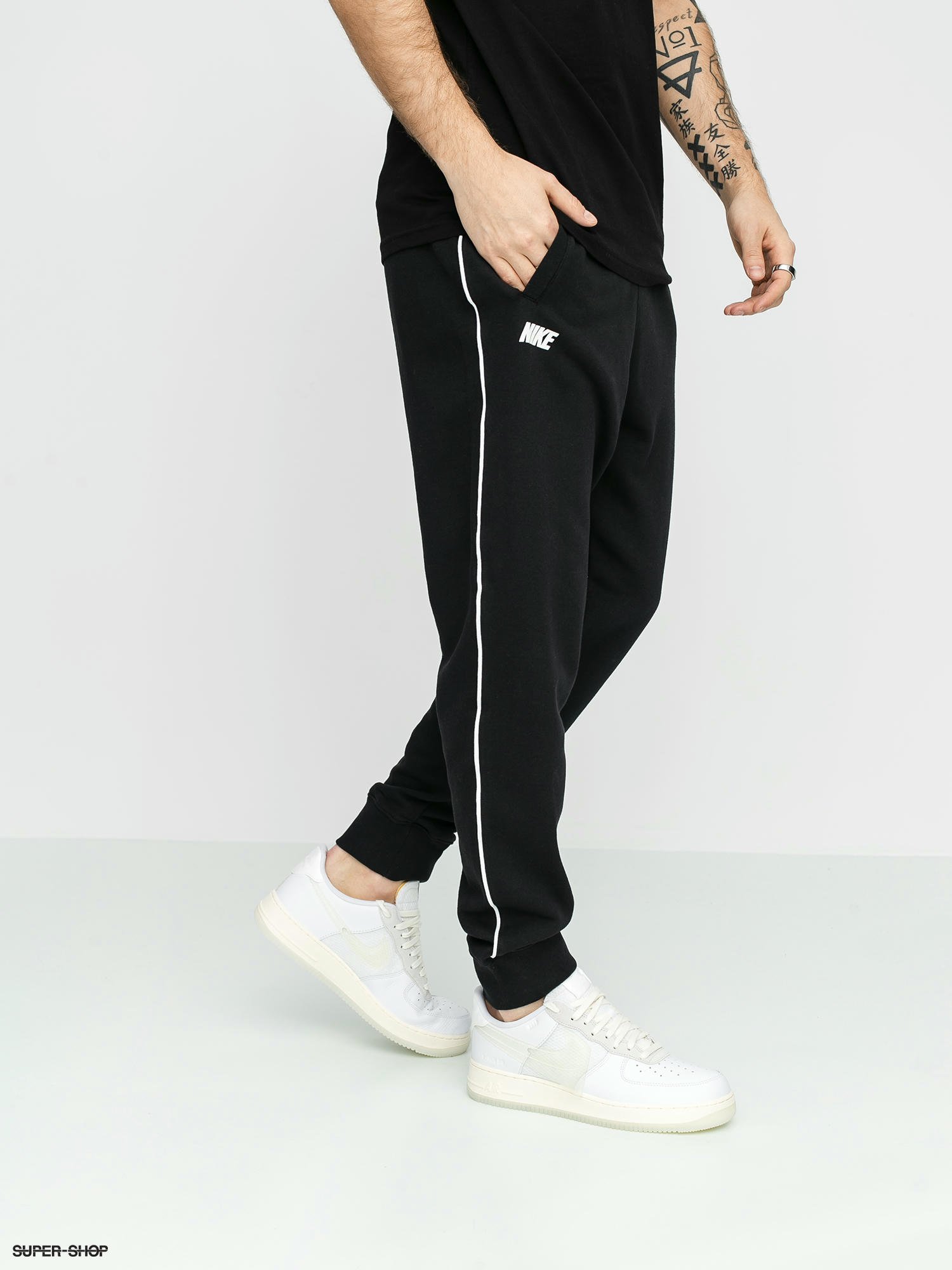 nike essential fleece multi logo tracksuit in white