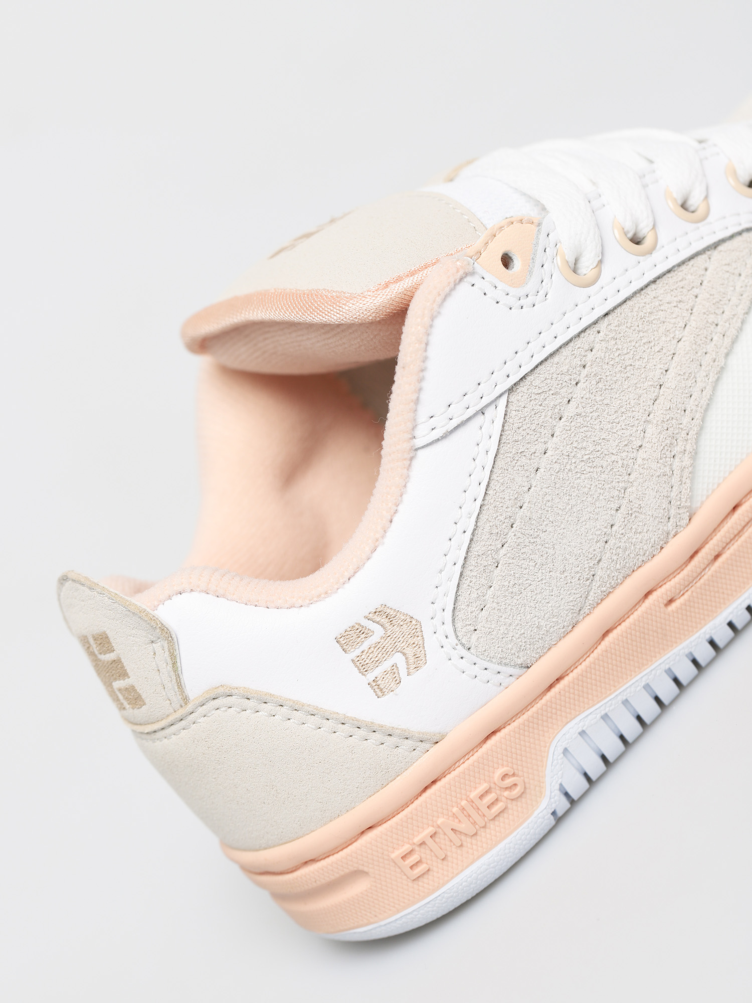 pink and white etnies