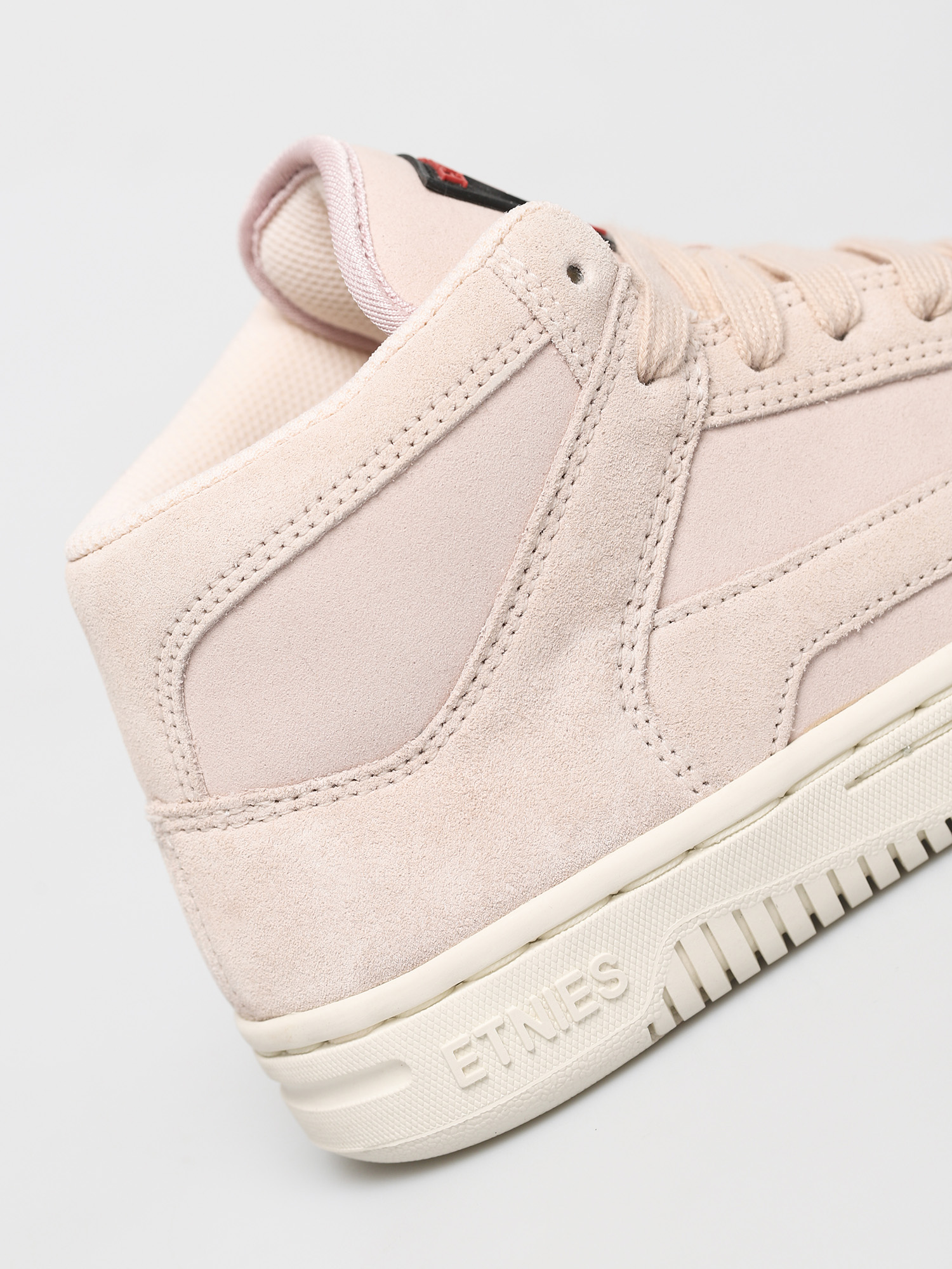 pink and white etnies