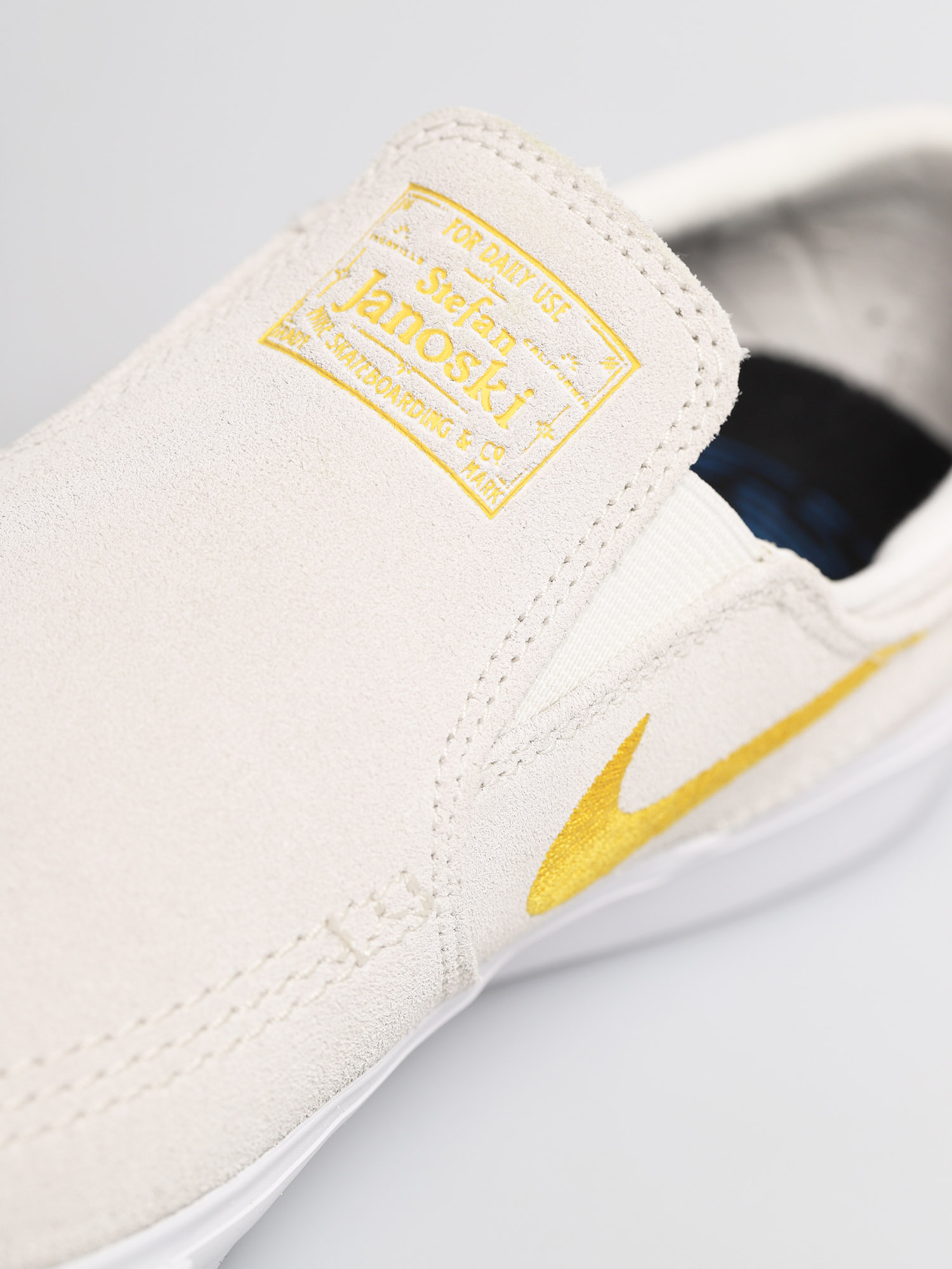 white and gold janoskis