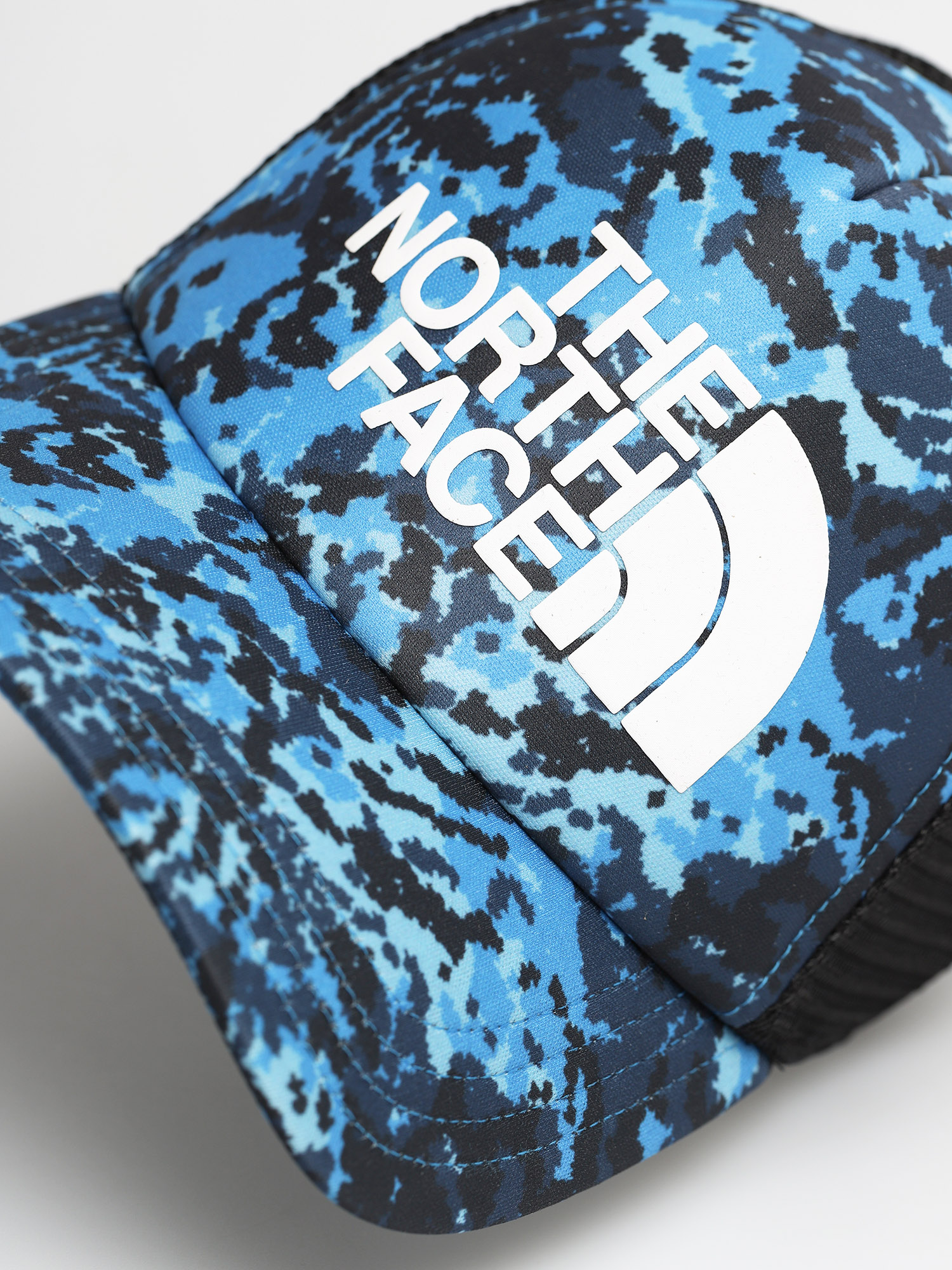 The North Face TNF Logo Trucker ZD Cap (clearlakebluhimalayncmprt)