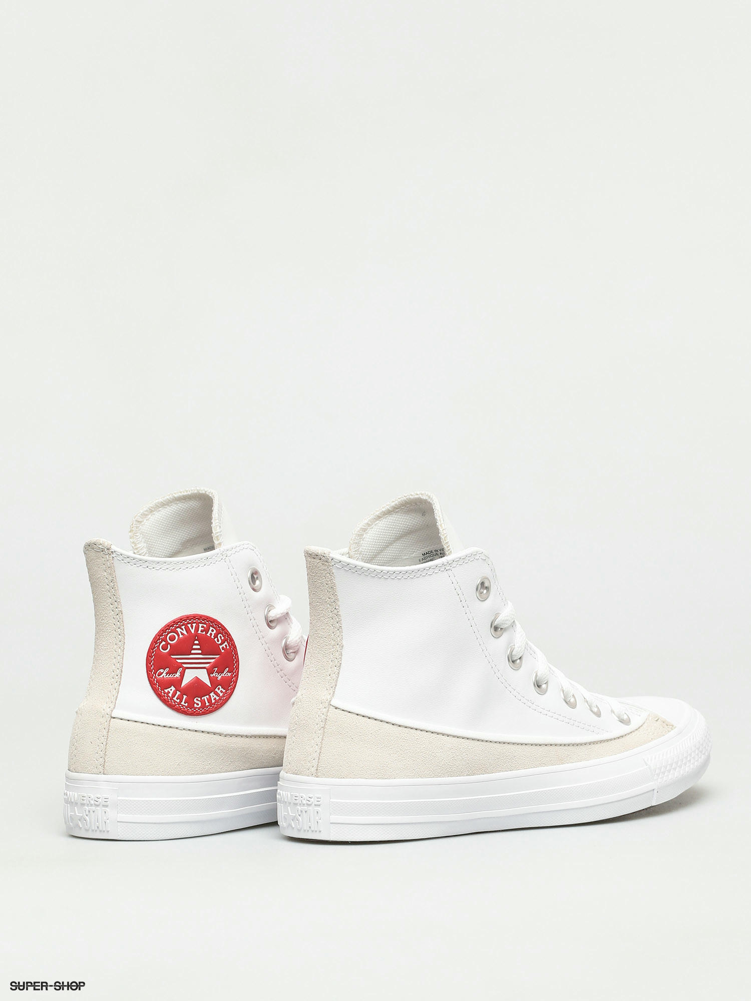 all white high top chuck taylors