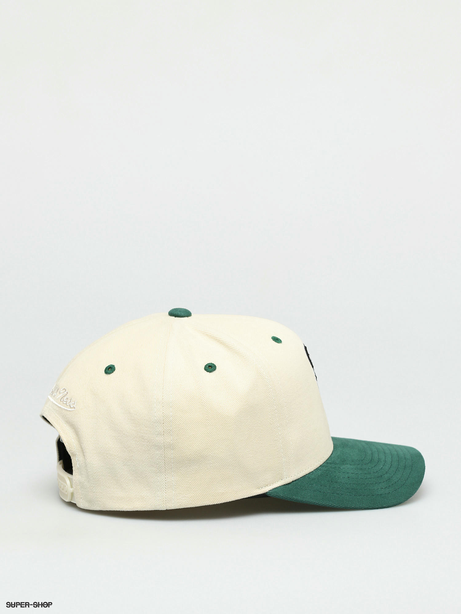 white and green cap