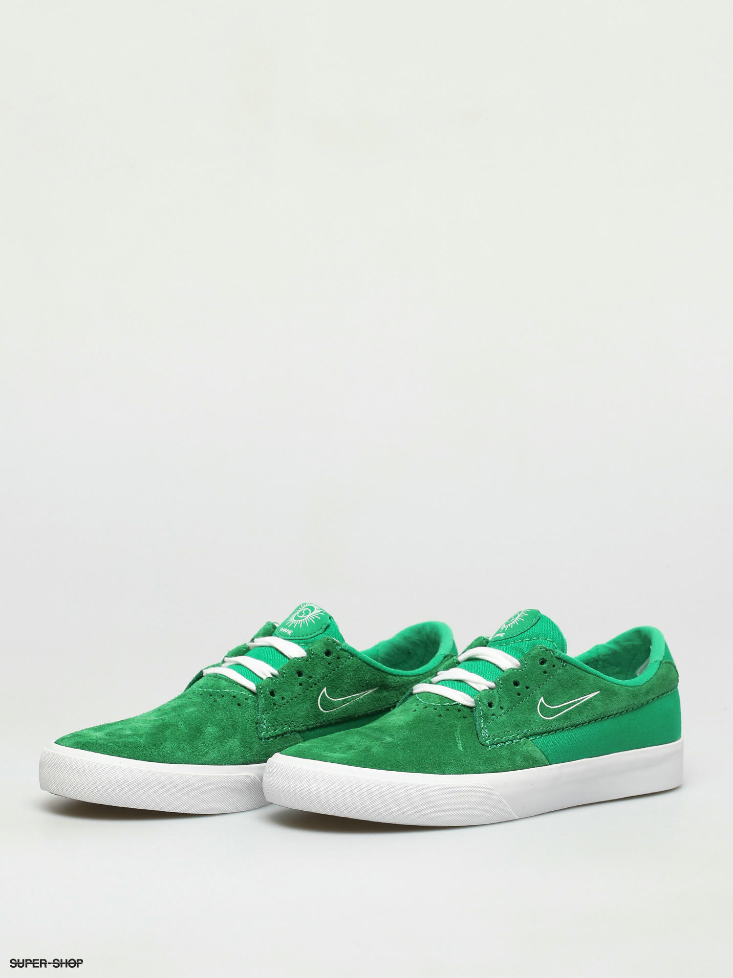 green suede nike shoes