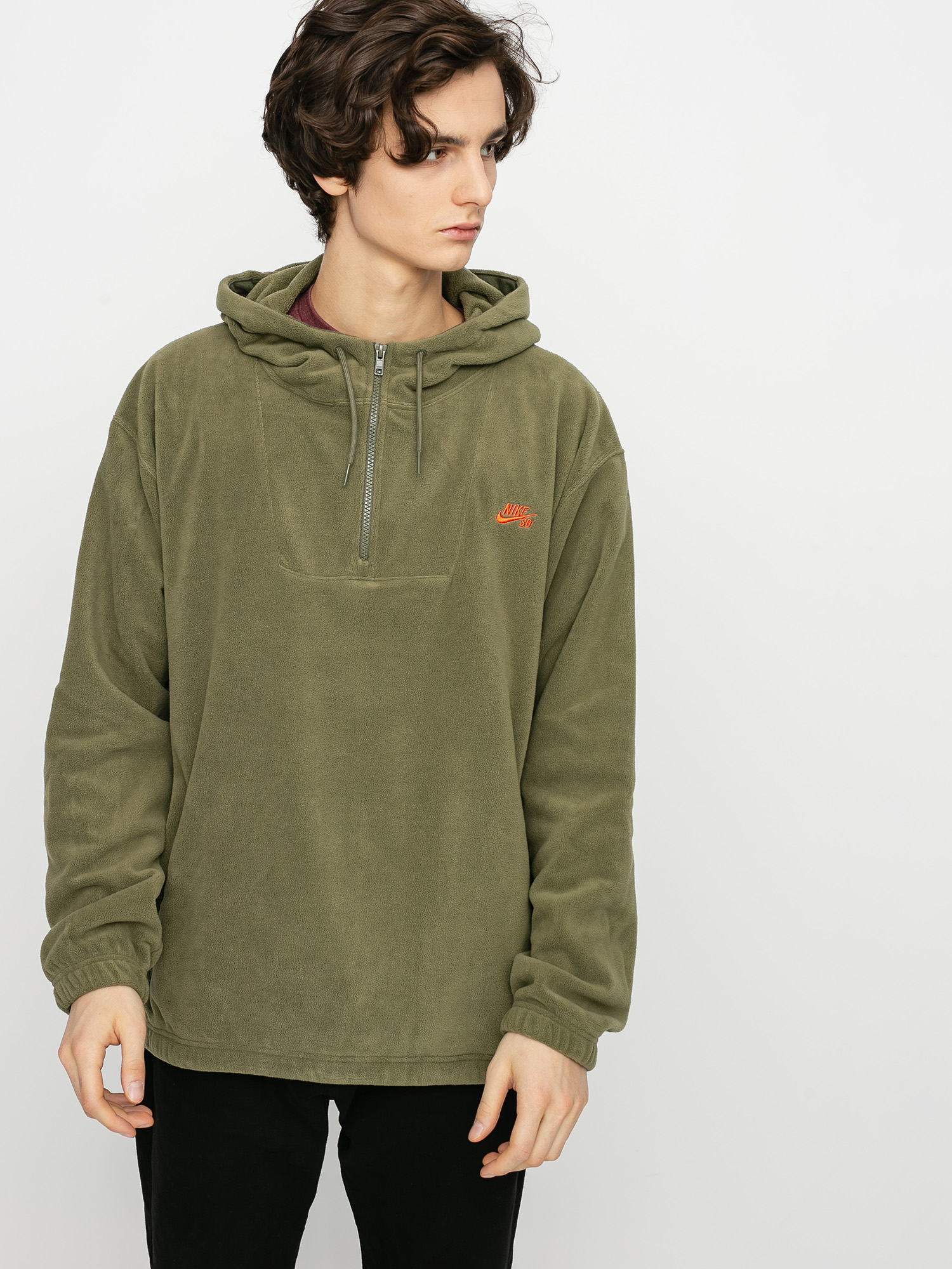 olive green and orange nike jacket