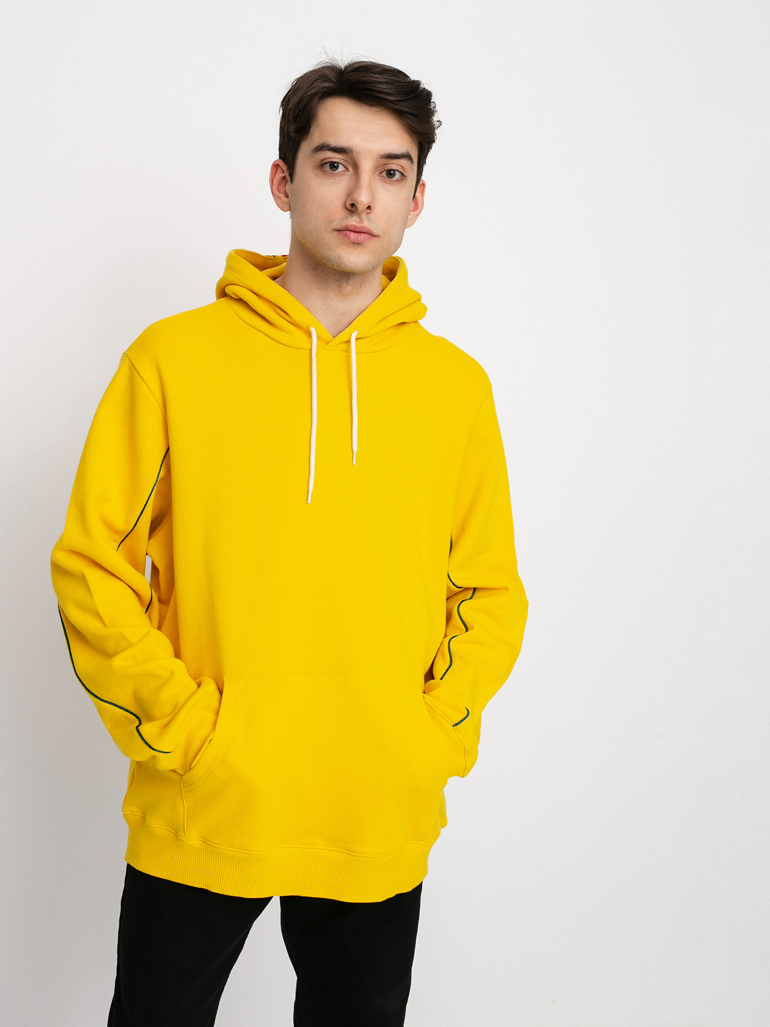 yellow hoodie with checkered sleeves