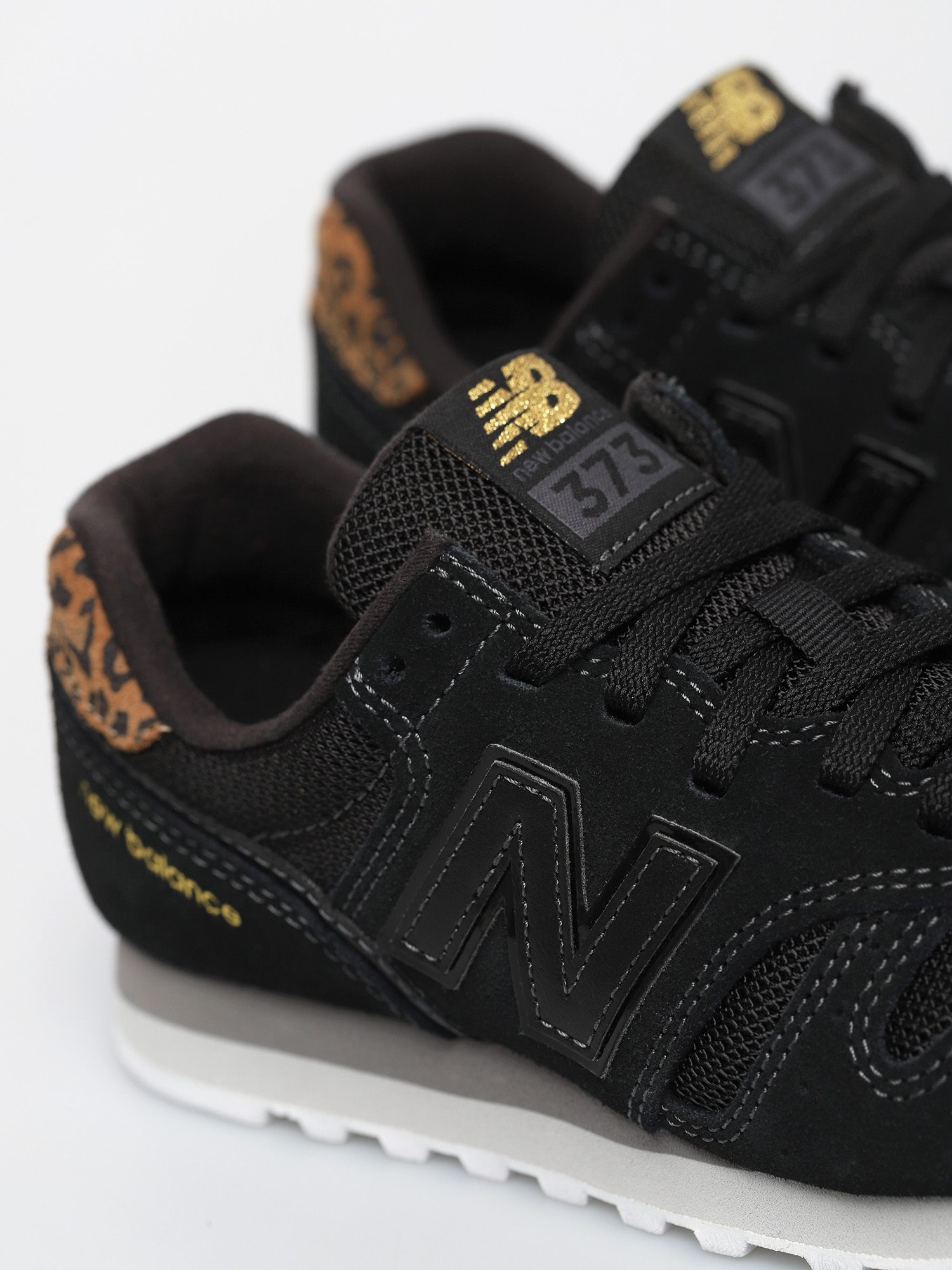 all black new balance 373