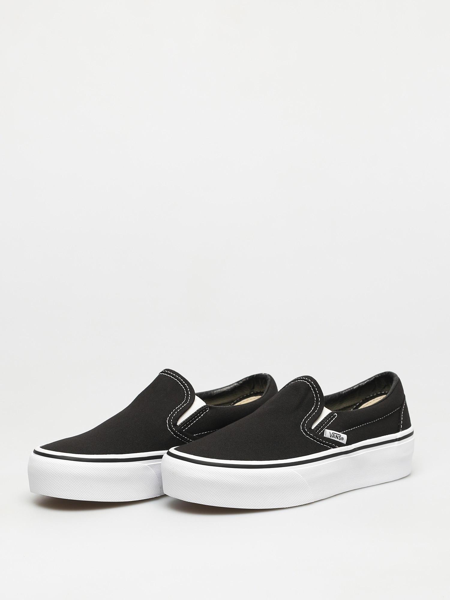 vans black platform slip ons