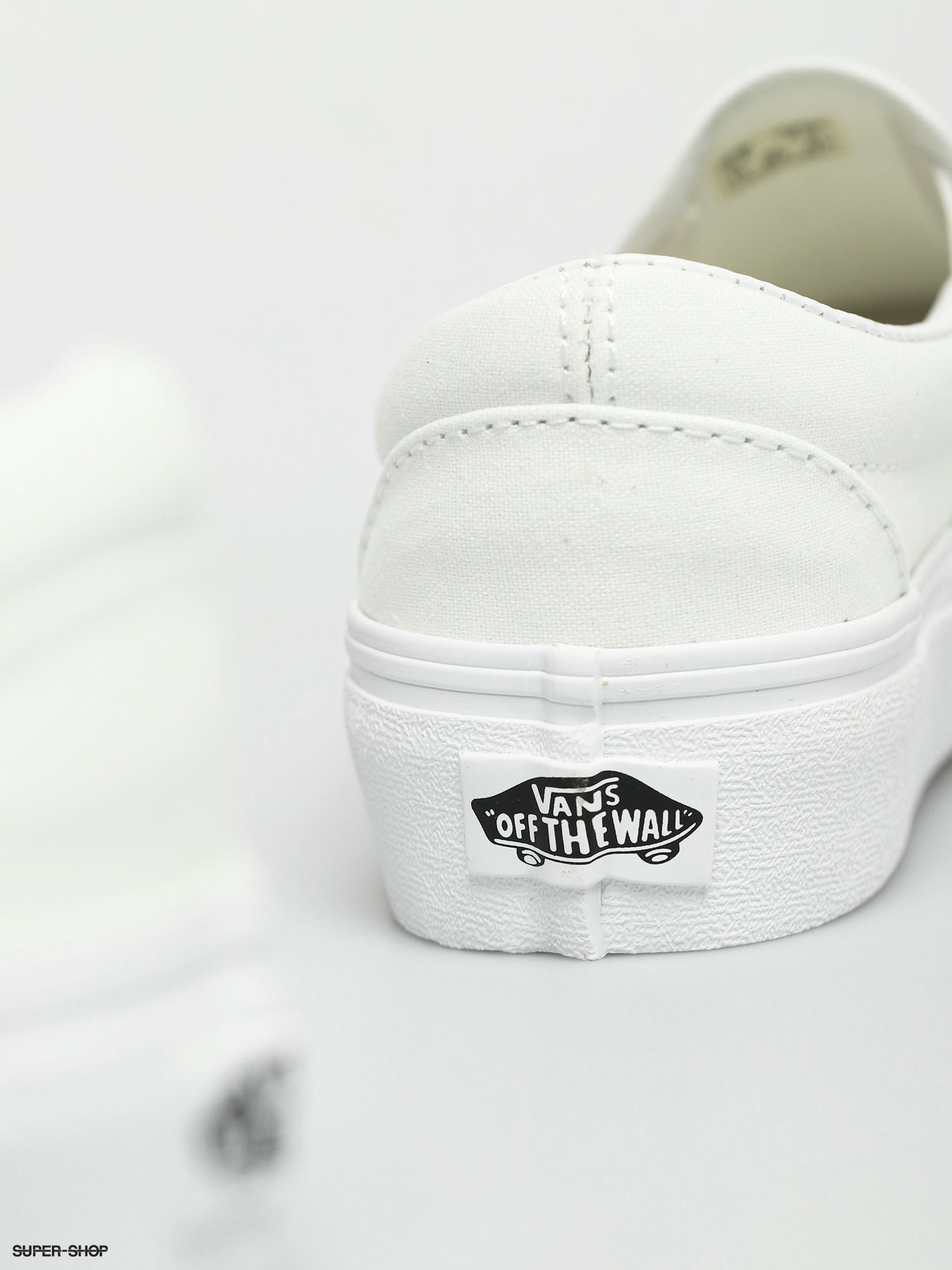 platform slip on vans white