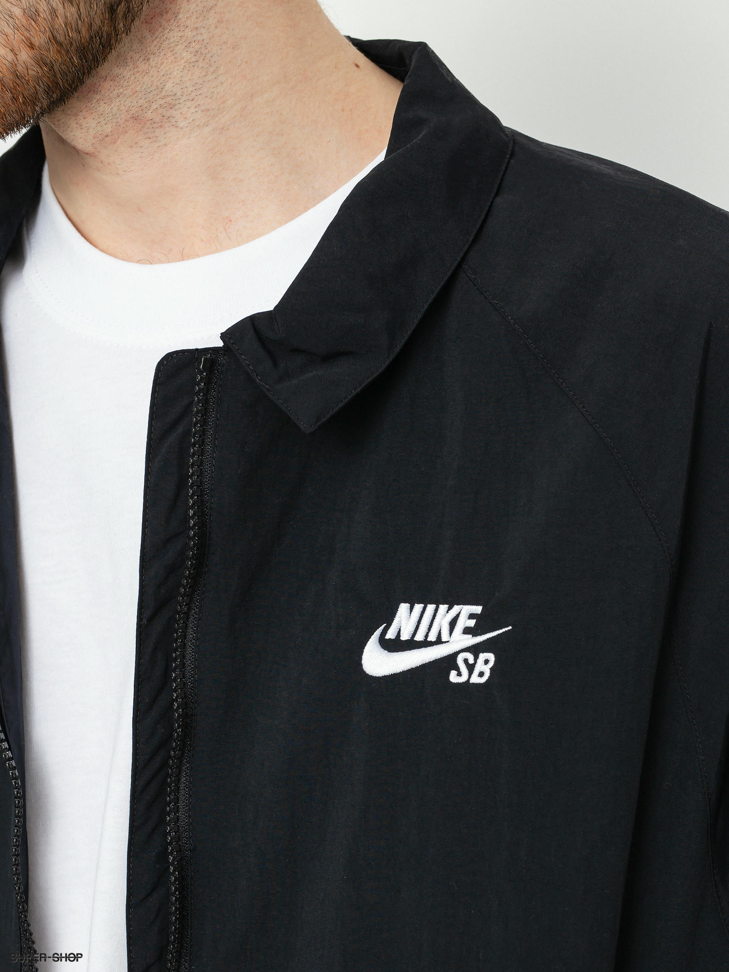 black nike coach jacket