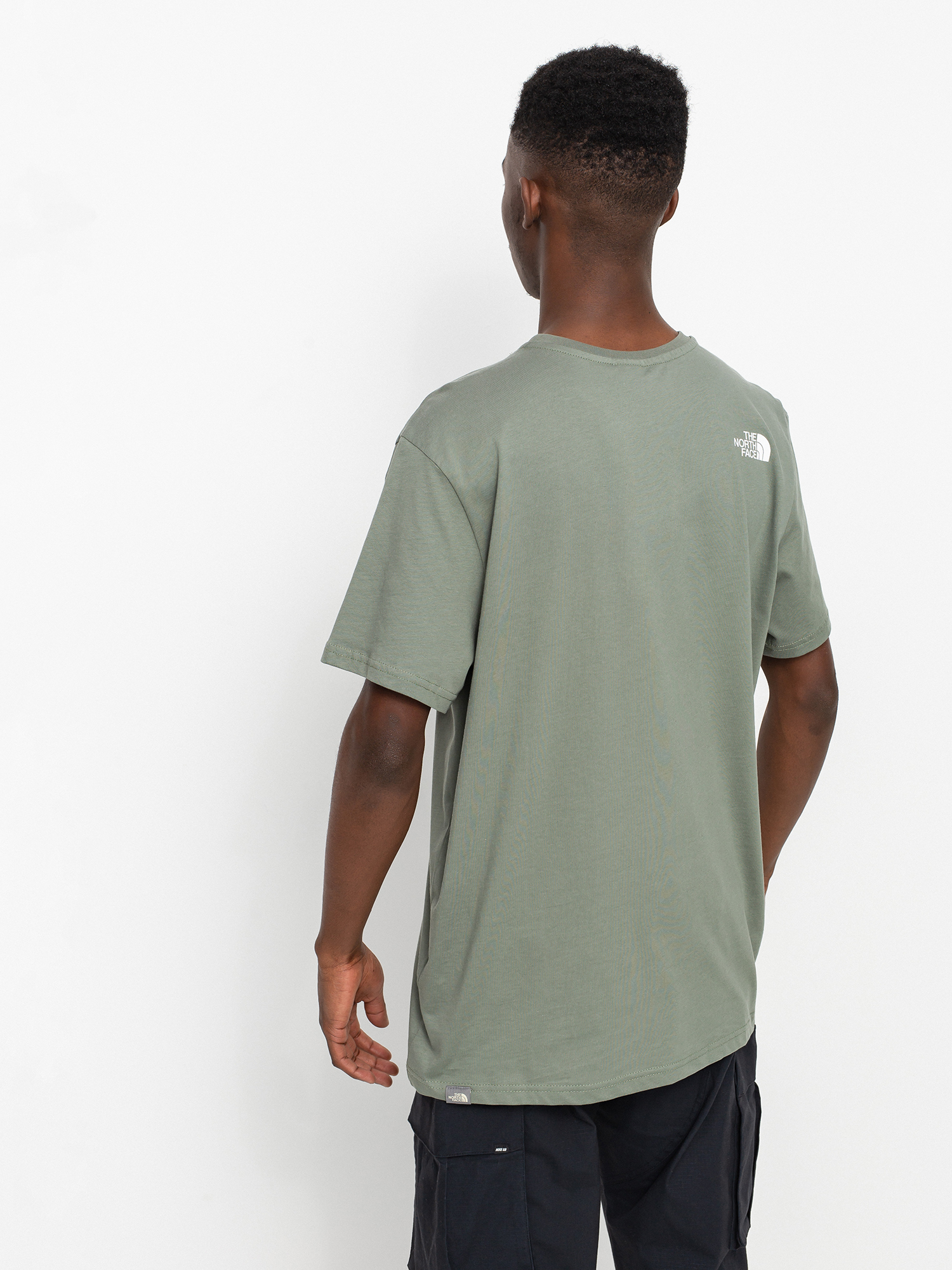 green north face shirt