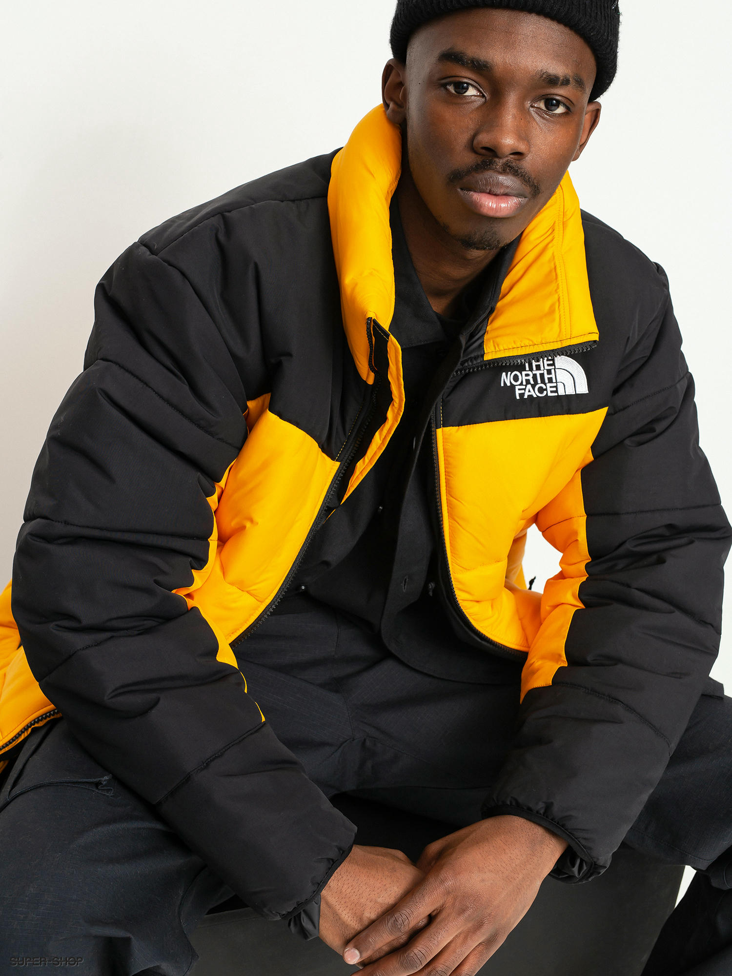 Gold and black deals north face jacket