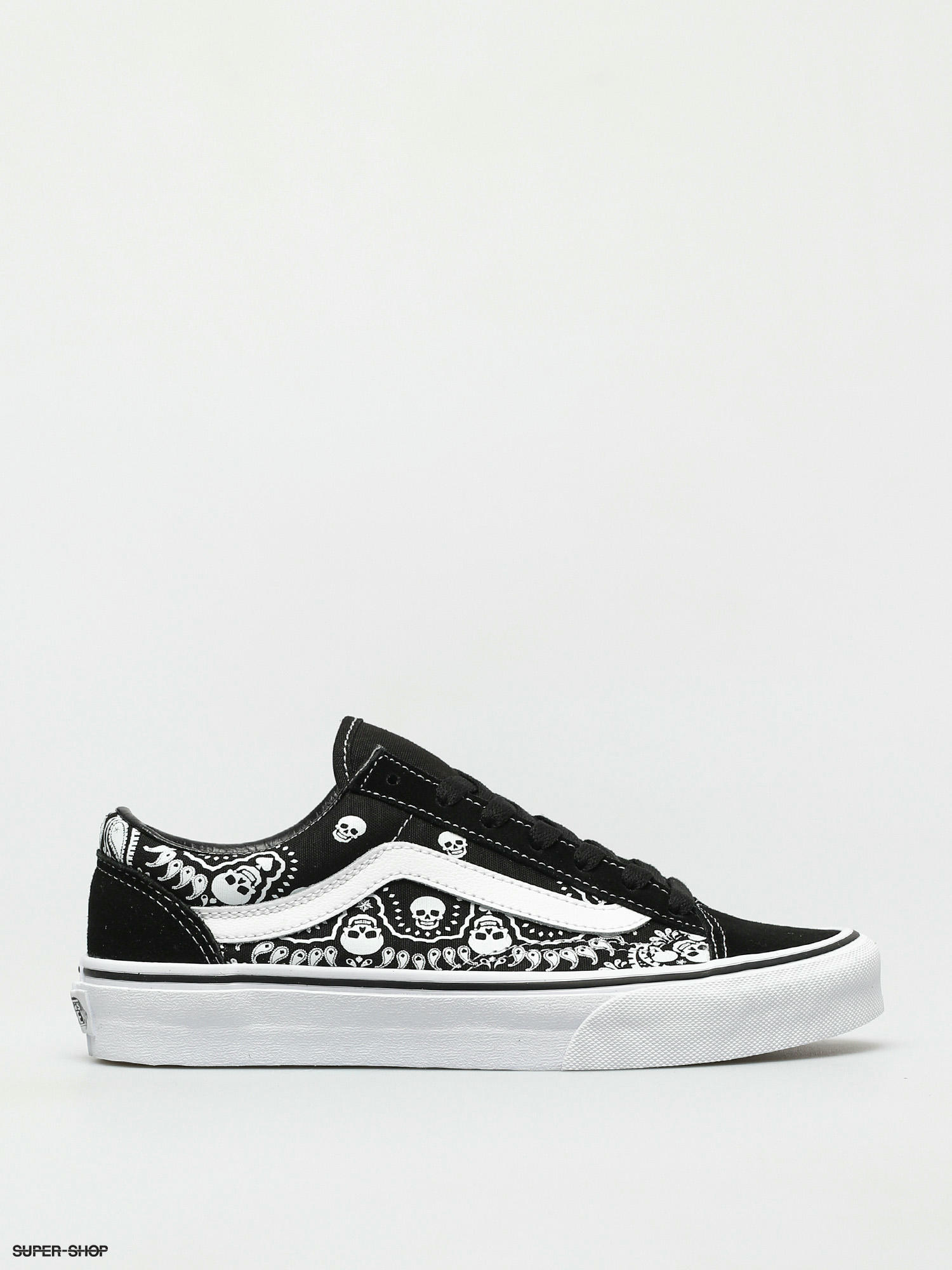 black and white vans with designs