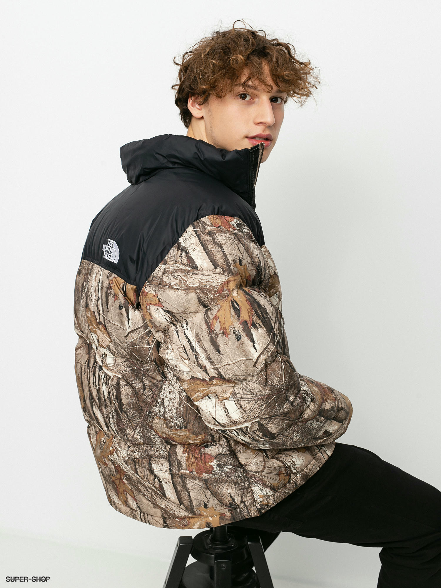 north face puffer tan