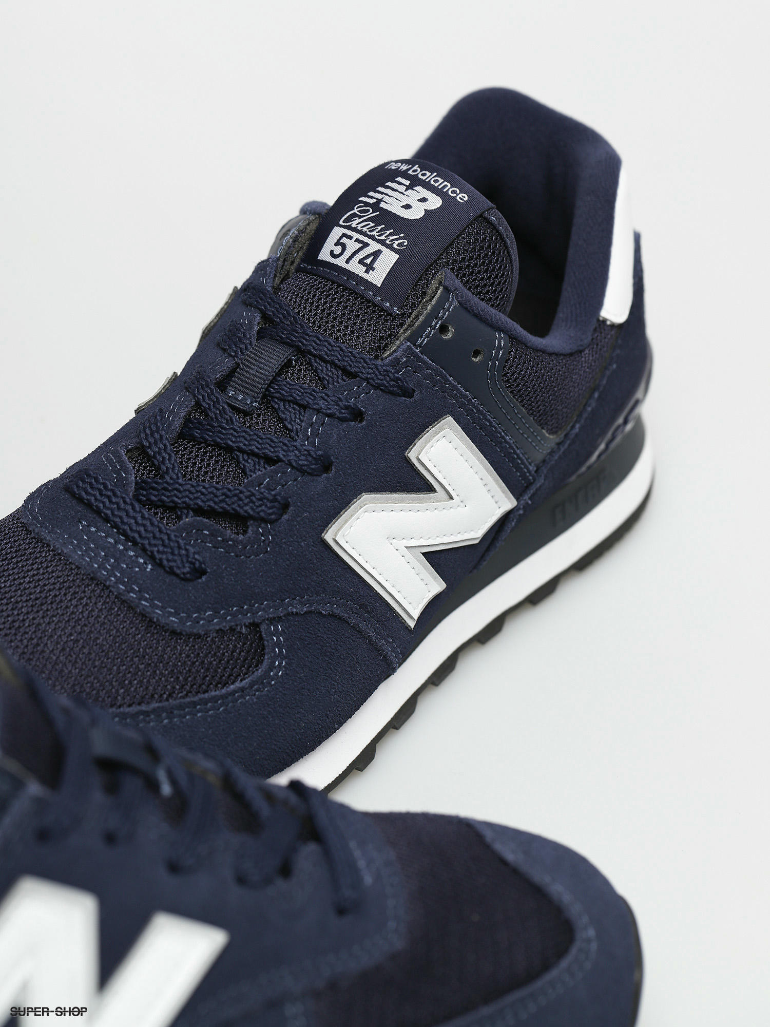 blue and white new balance 574