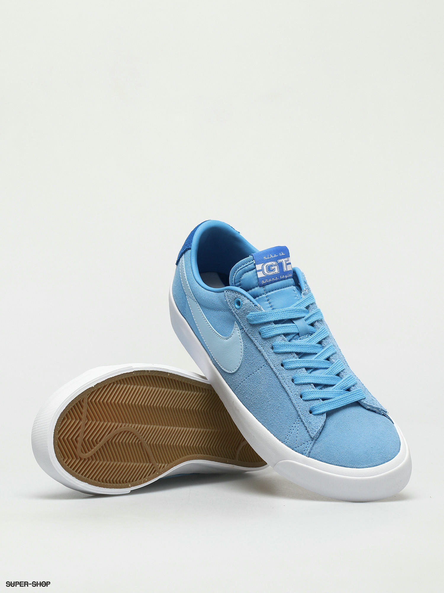 Itaca Caña junto a Nike SB Zoom Blazer Low Pro Gt Shoes (coast/psychic blue signal blue white)