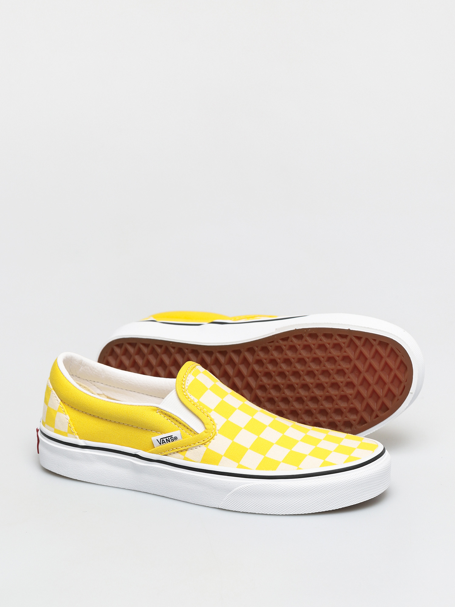 yellow and white checkered vans slip on