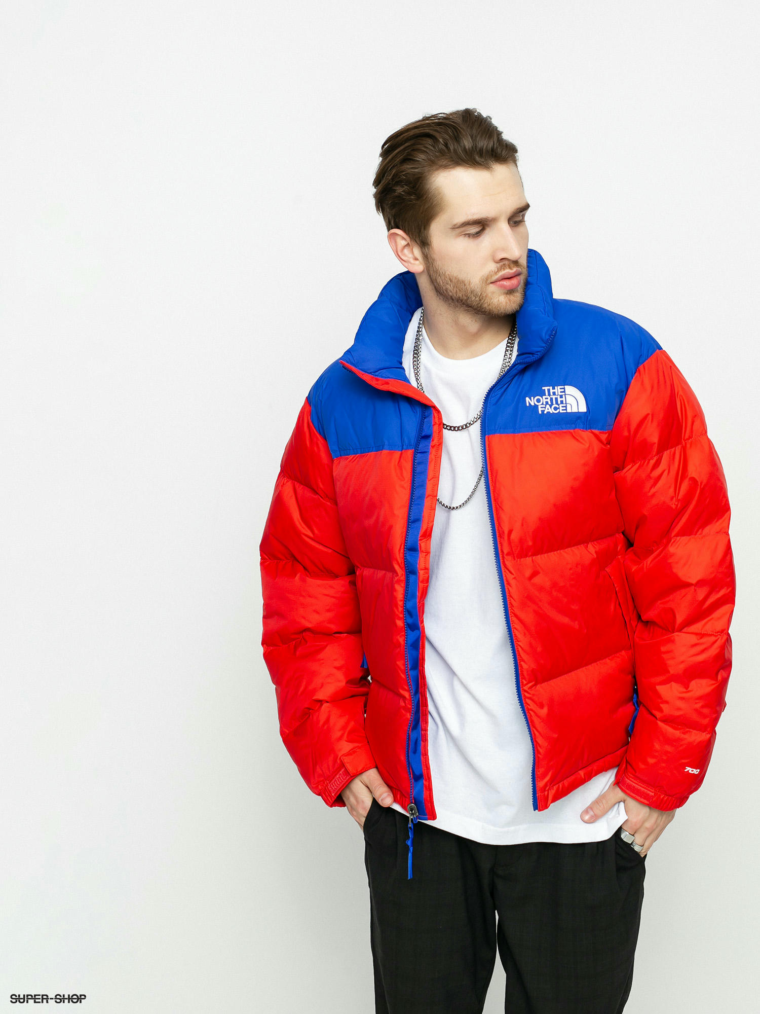 red and blue north face jacket