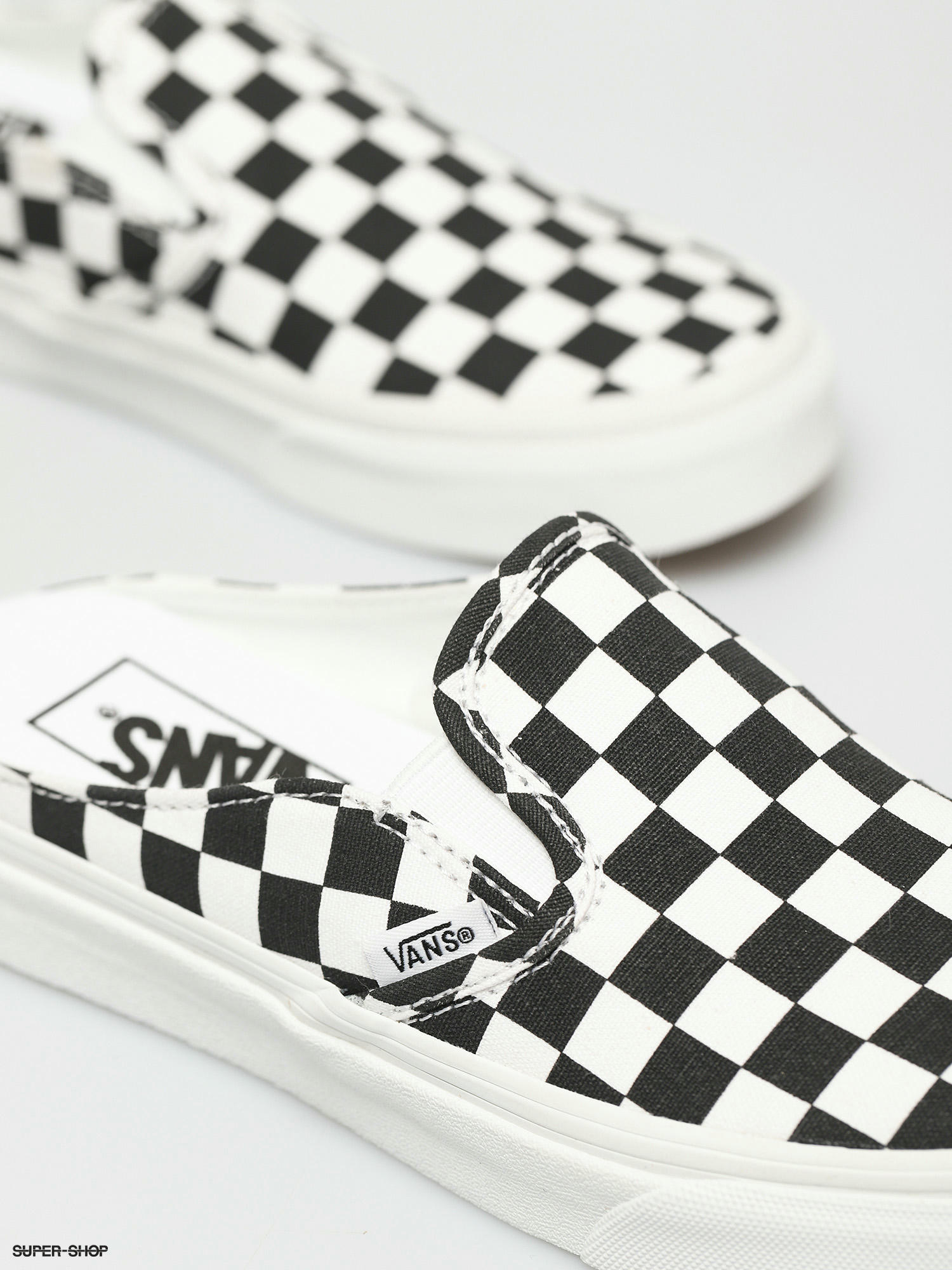 black and white check vans slip on