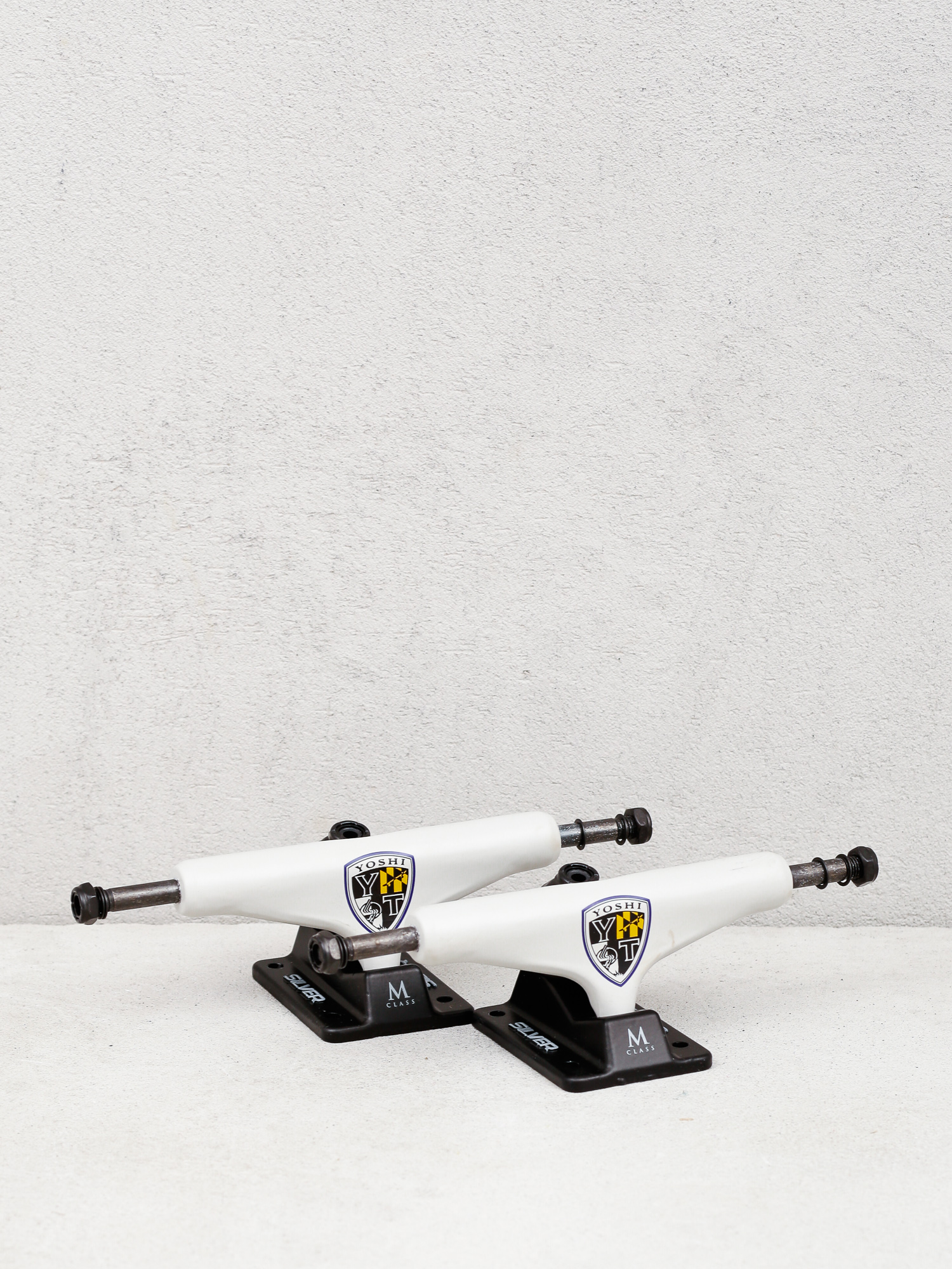 Silver M Class Hollow Yoshi Tanenbaum Trucks (white/black)