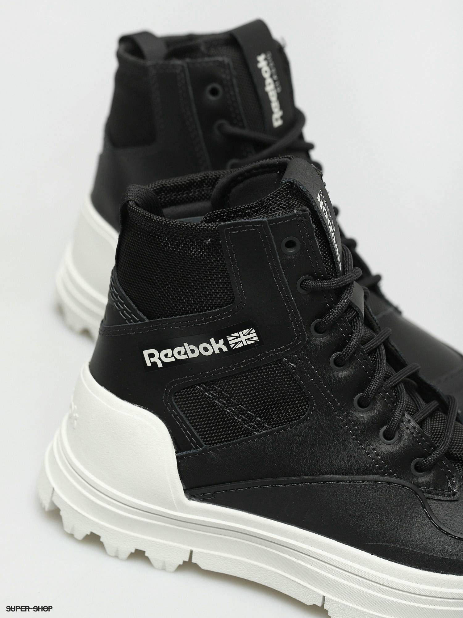 Reebok high ankle best sale shoes