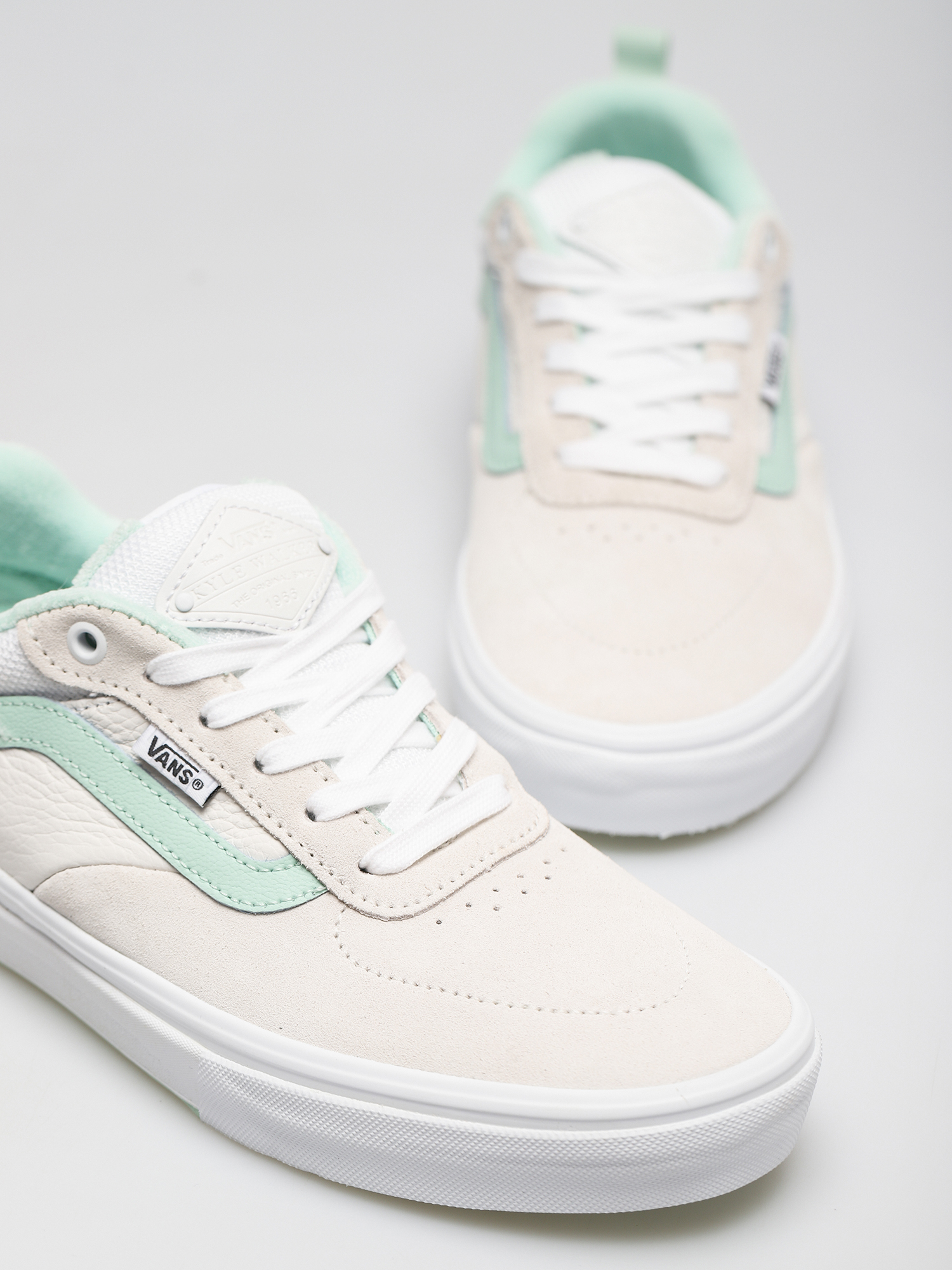 white and mint vans