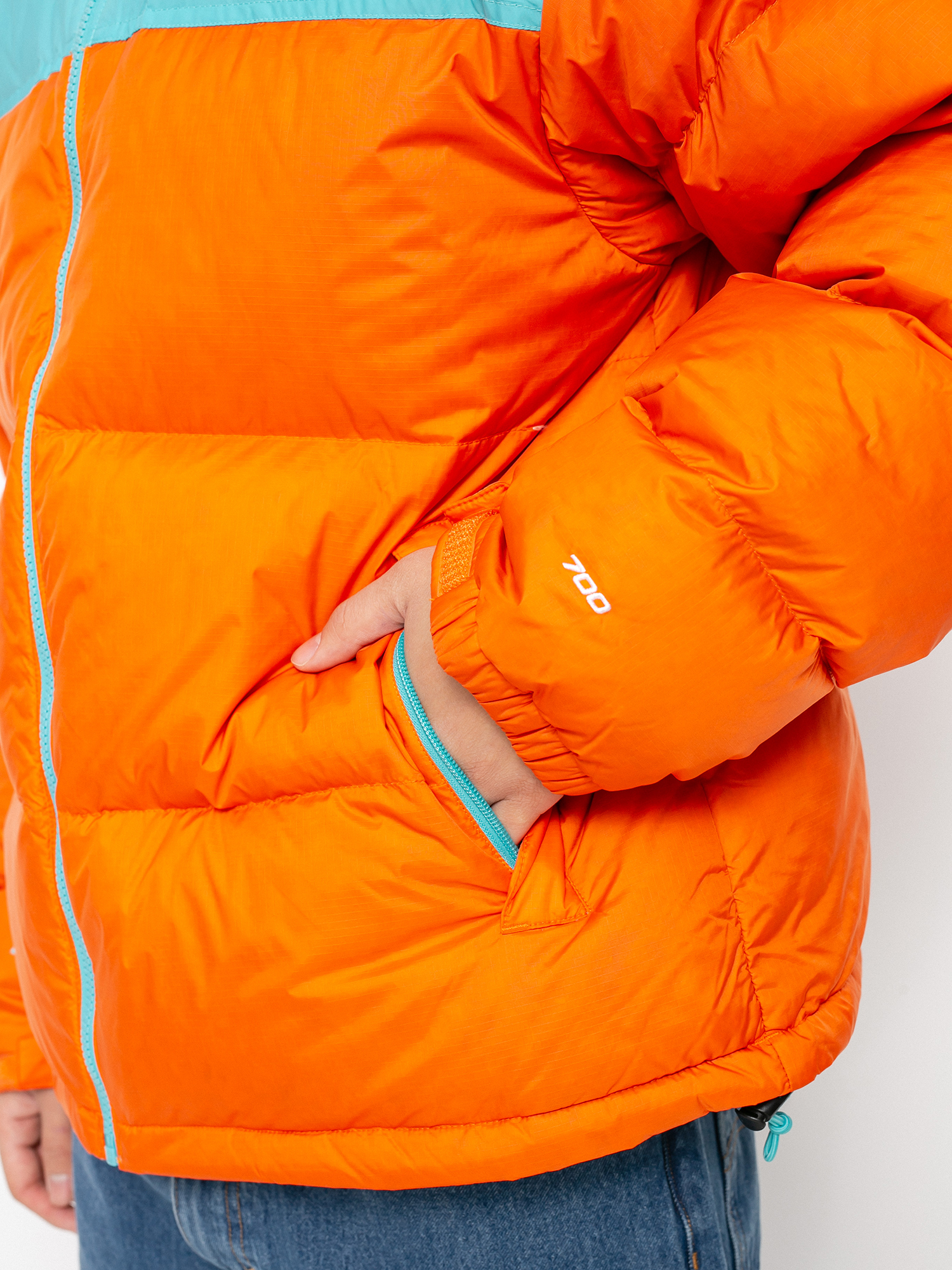 The North Face 1996 Retro Nuptse Jacke (red orange/transantarctic blue)