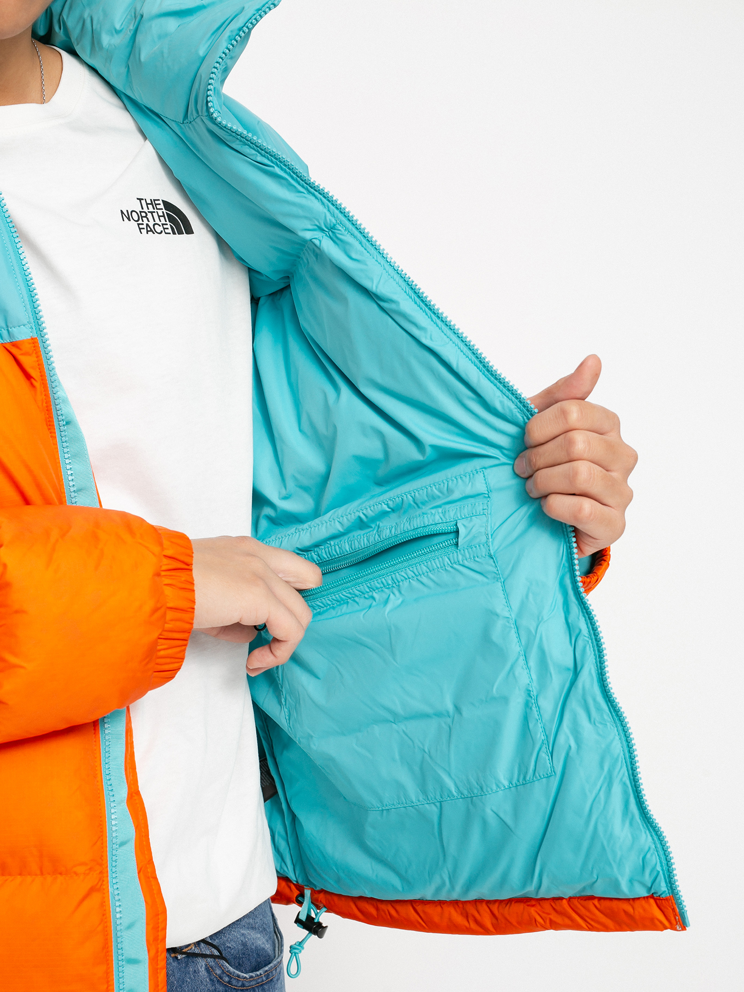 The North Face 1996 Retro Nuptse Jacke (red orange/transantarctic blue)