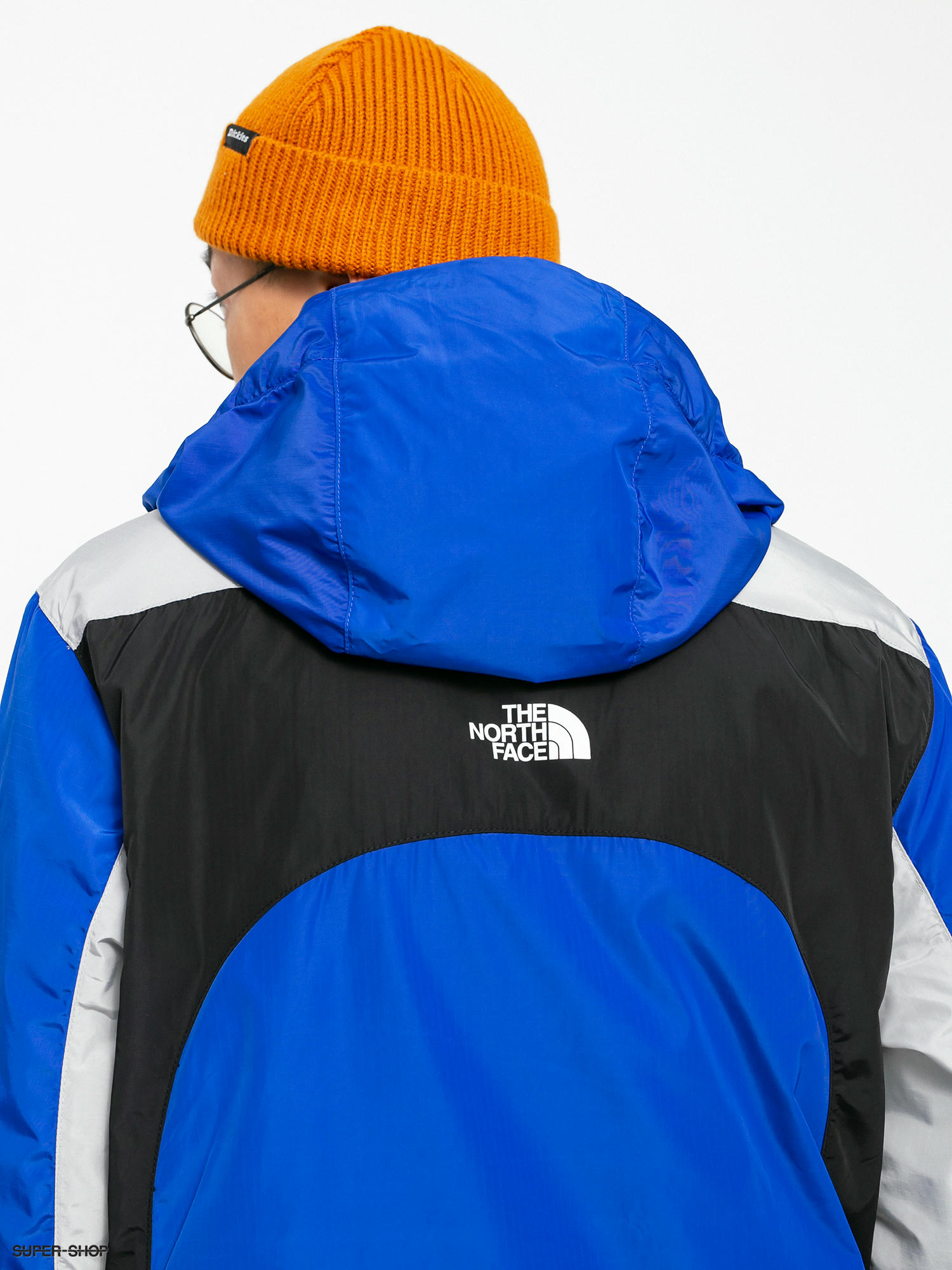 black and turquoise north face jacket