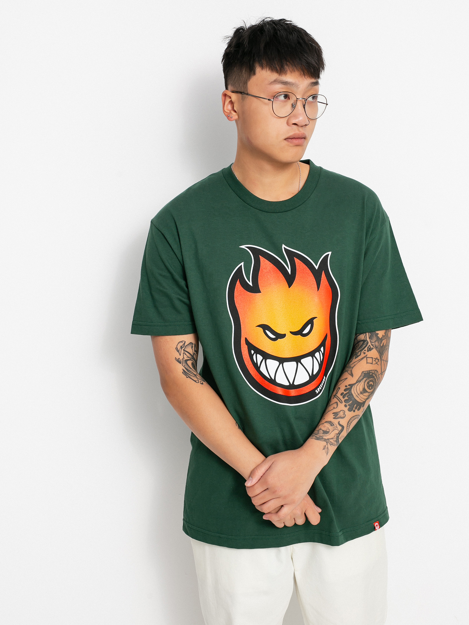 red gold and green t shirts