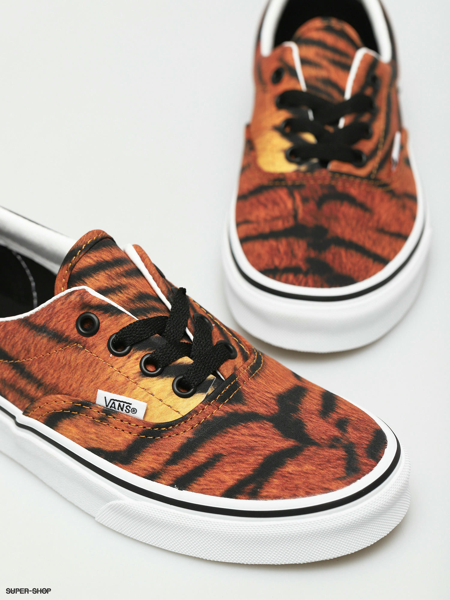 vans tiger era