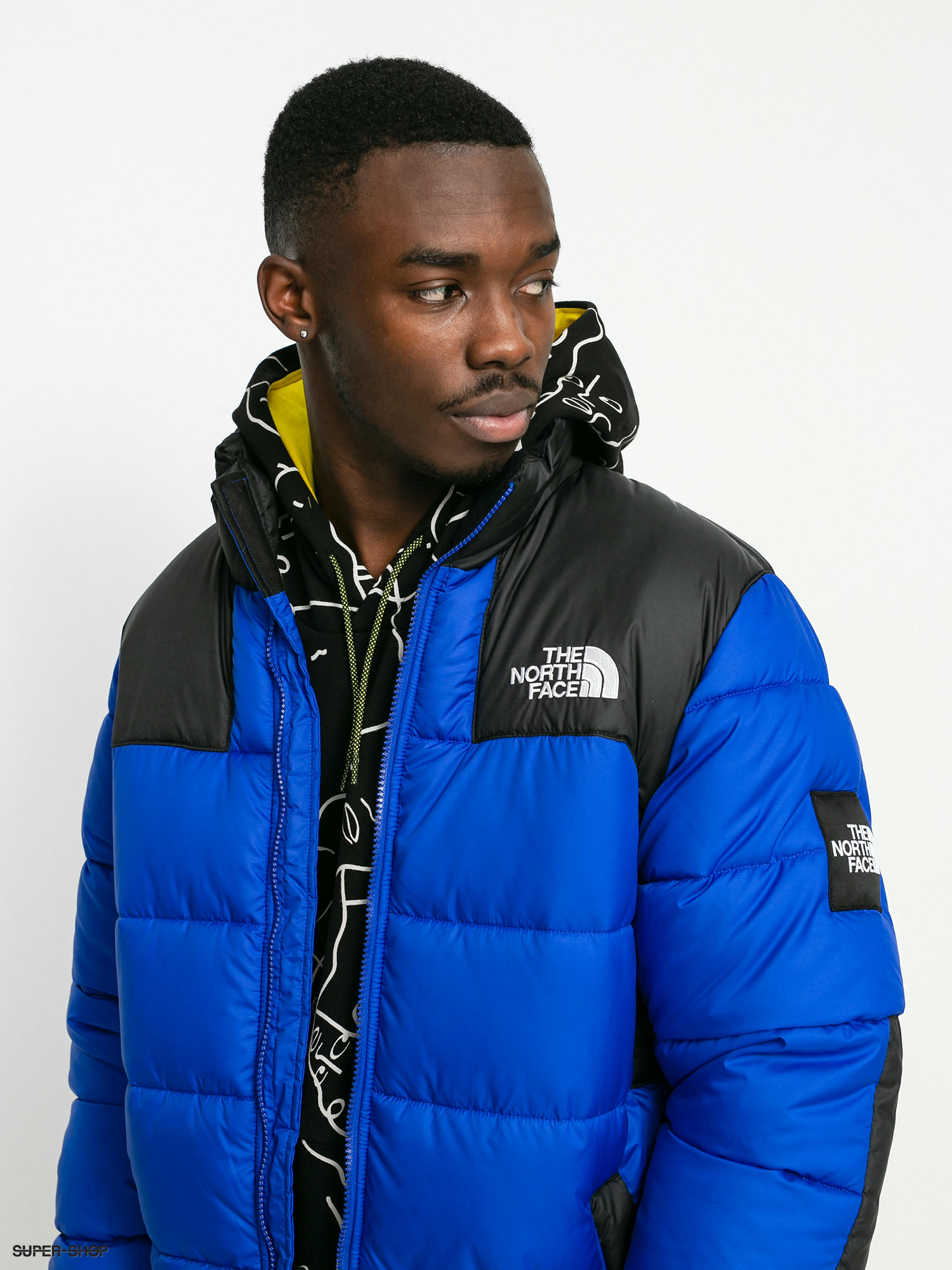 North face puffer store blue and black