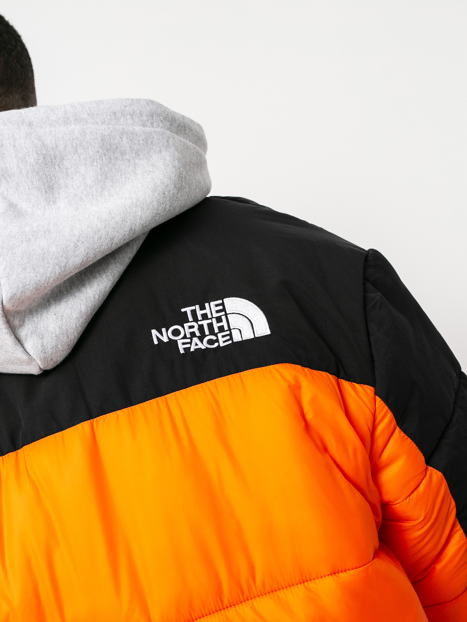 The North Face Hmlyn Insulated Jacket (red orange/tnf black)
