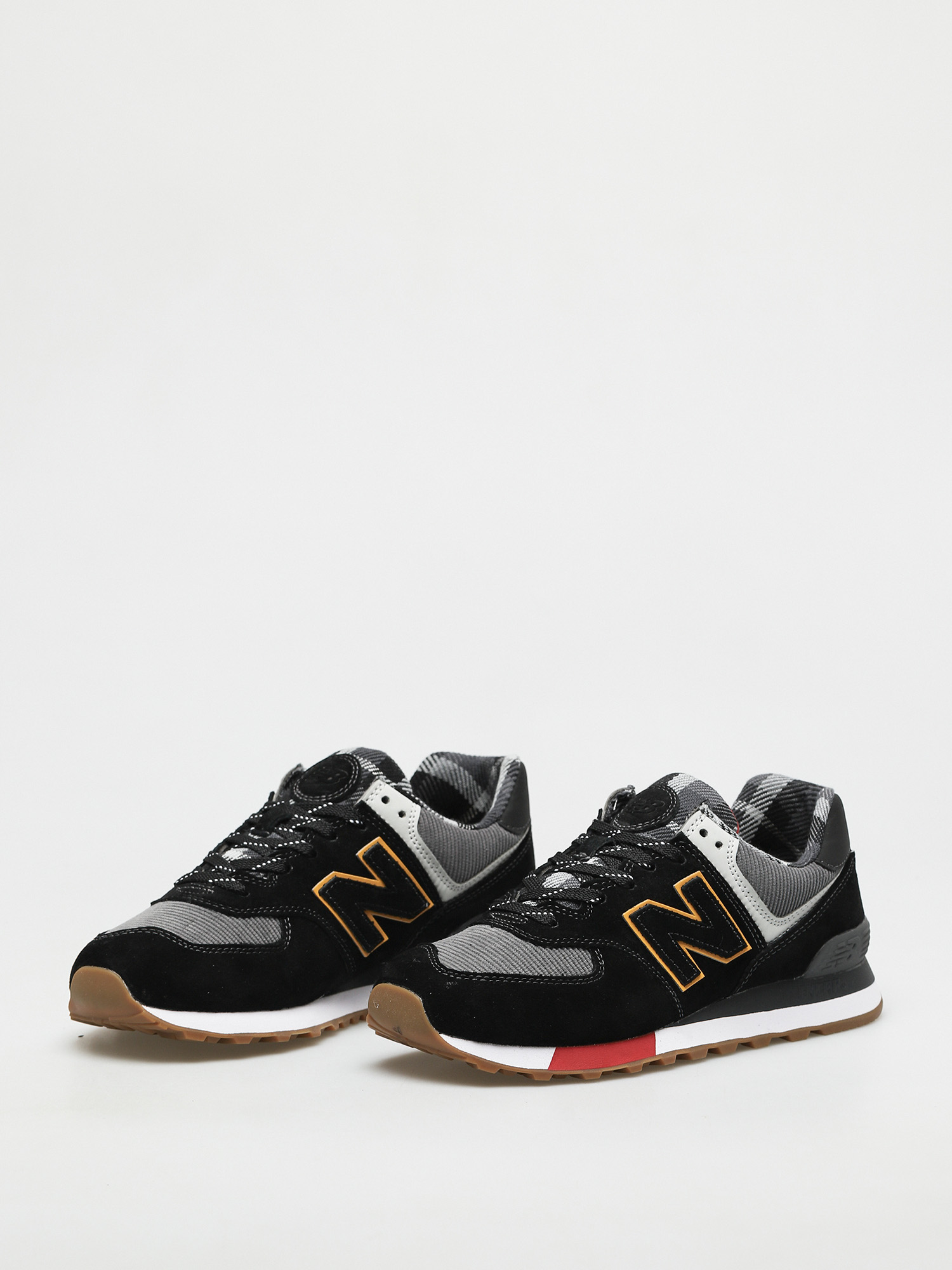 black and gold new balance 574