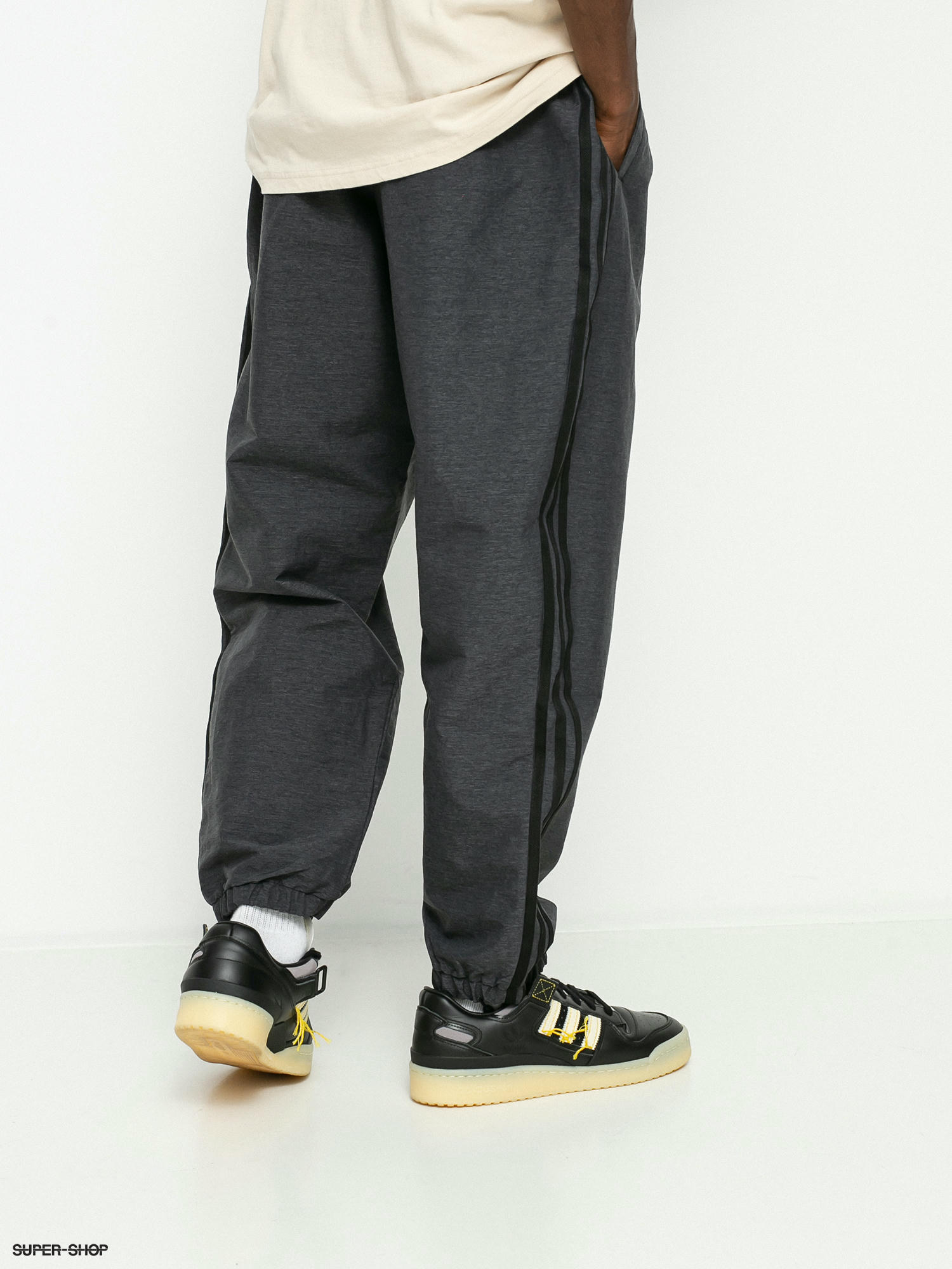 black sst track pants