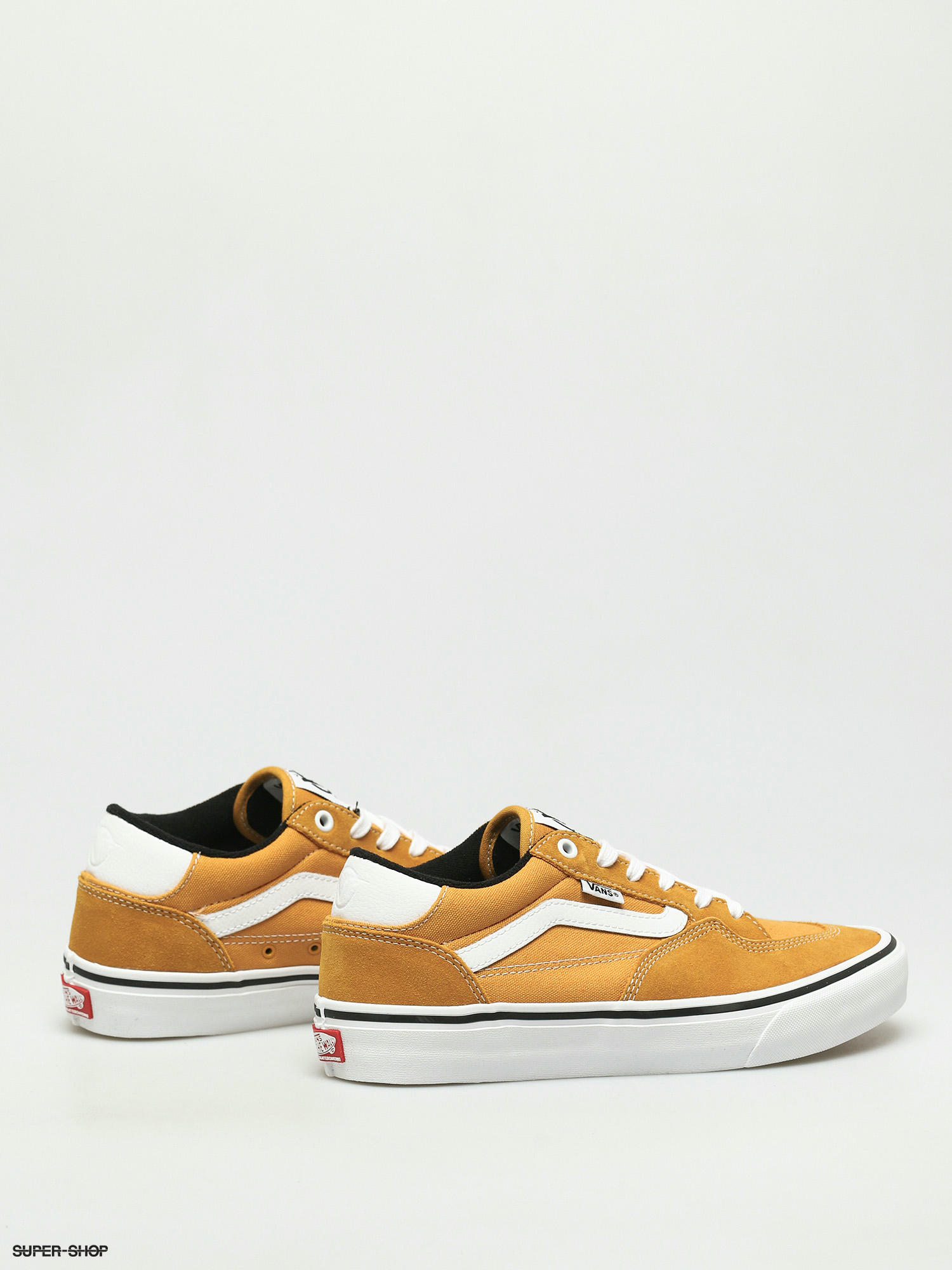 gold and white vans