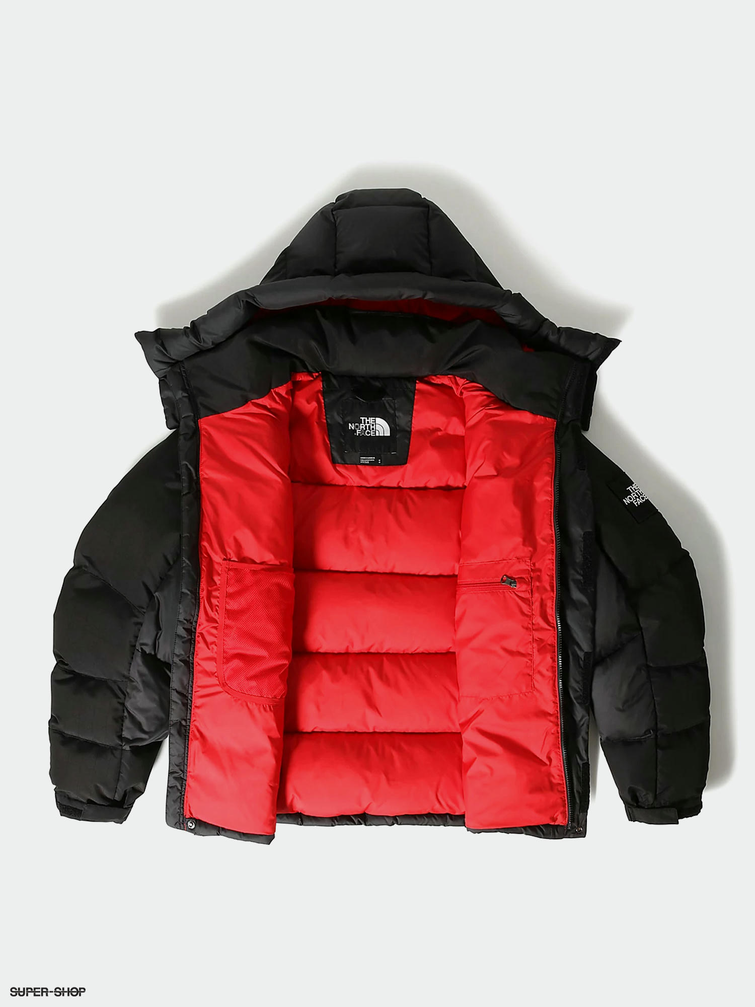 red and black north face vest