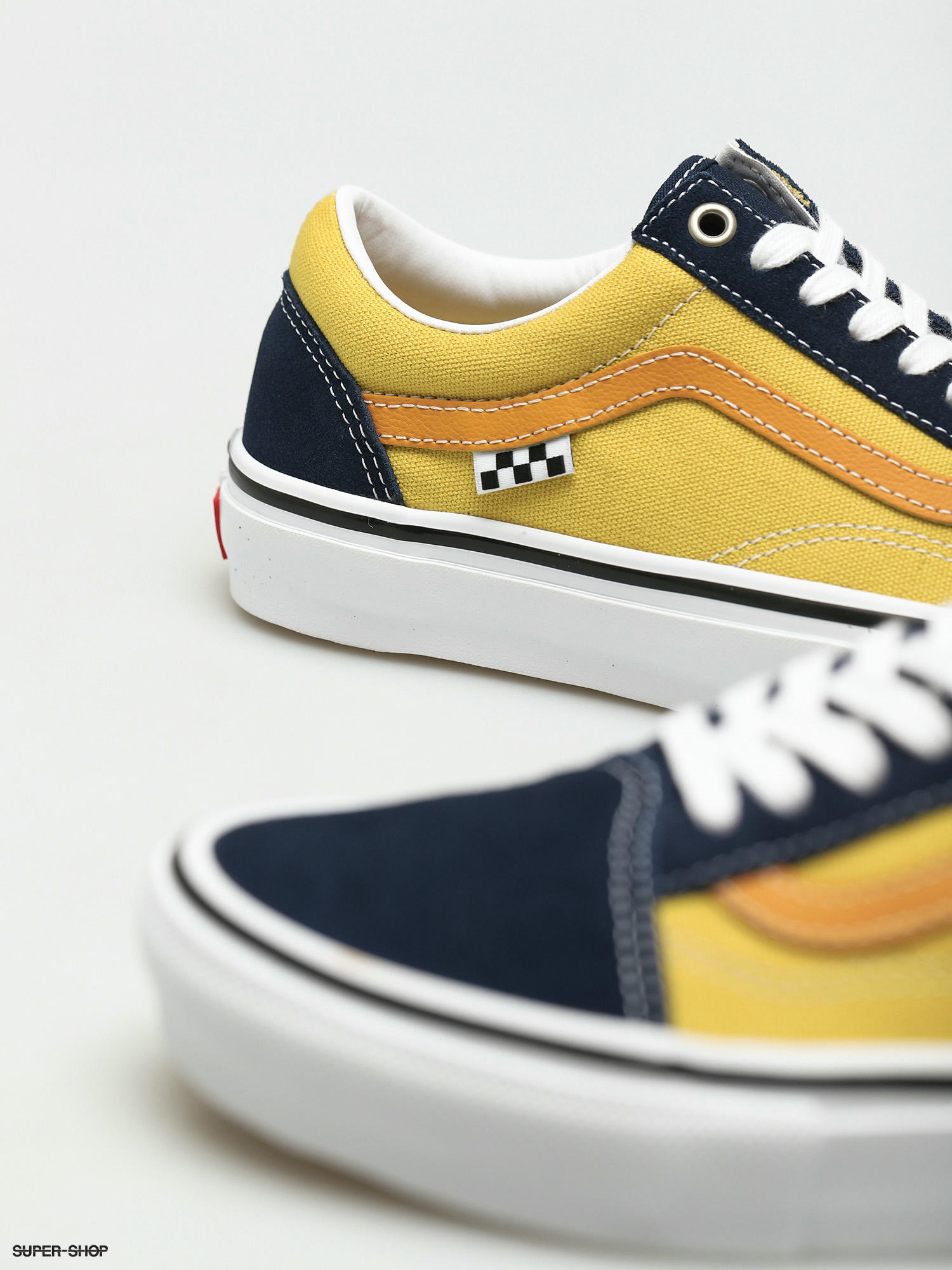 yellow and navy vans