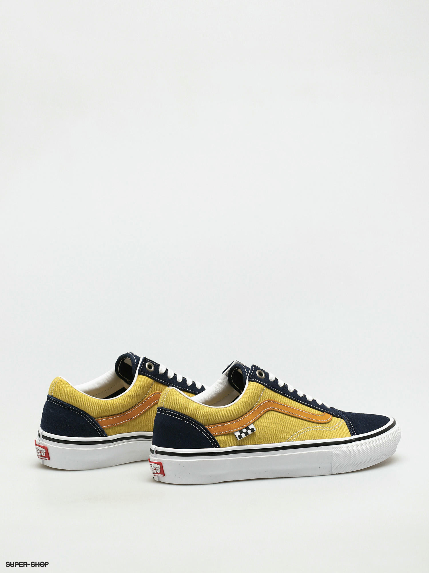 black white and gold vans